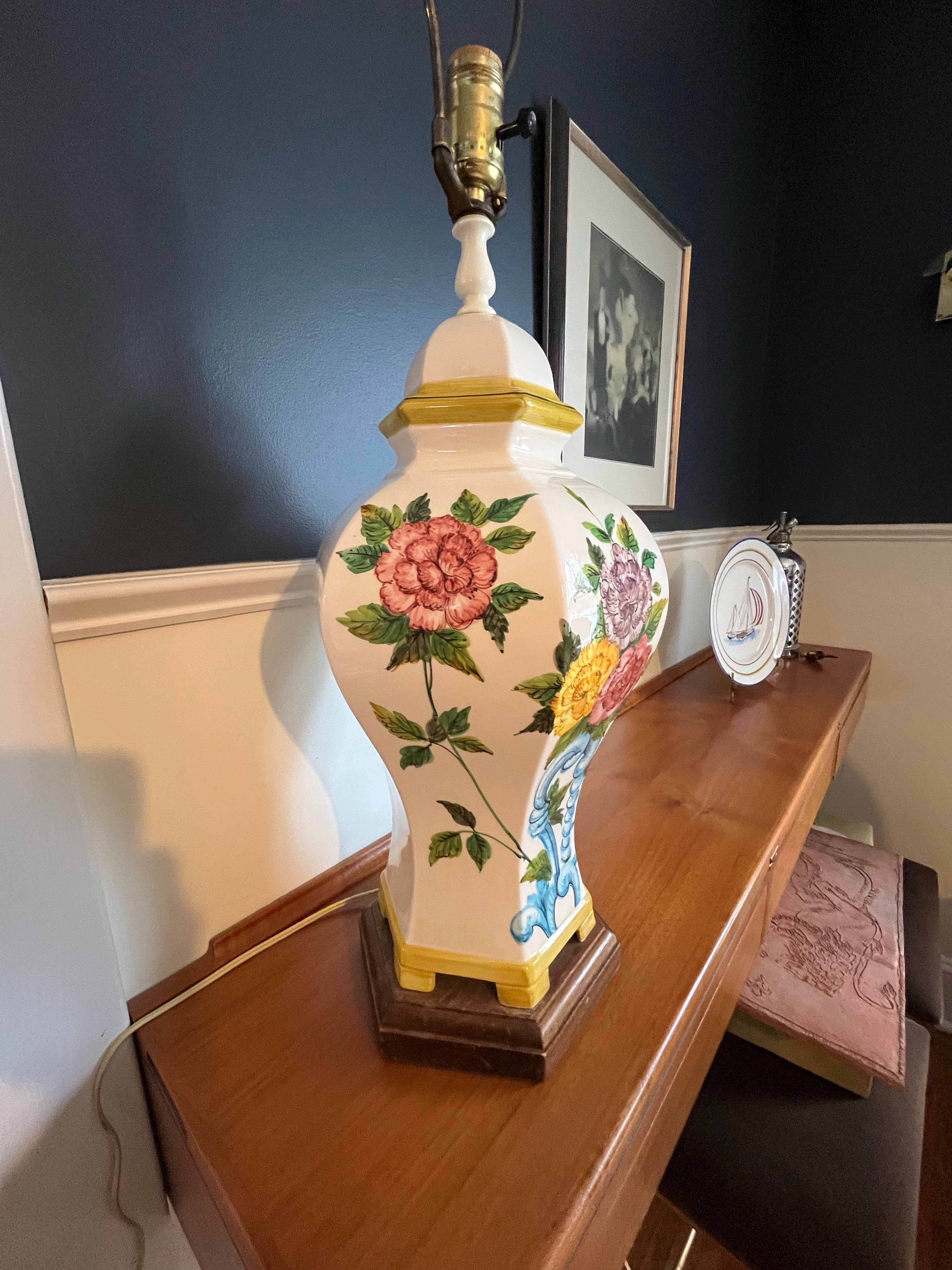 Beautiful hand painted Floral Ginger Jar lamp most likely Italian painted. Ceramic. Vibrant florals with classic Ginger Jar form. Measures 20.5