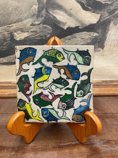 Vintage Hand Painted Tile With Swimming Fish Motif.