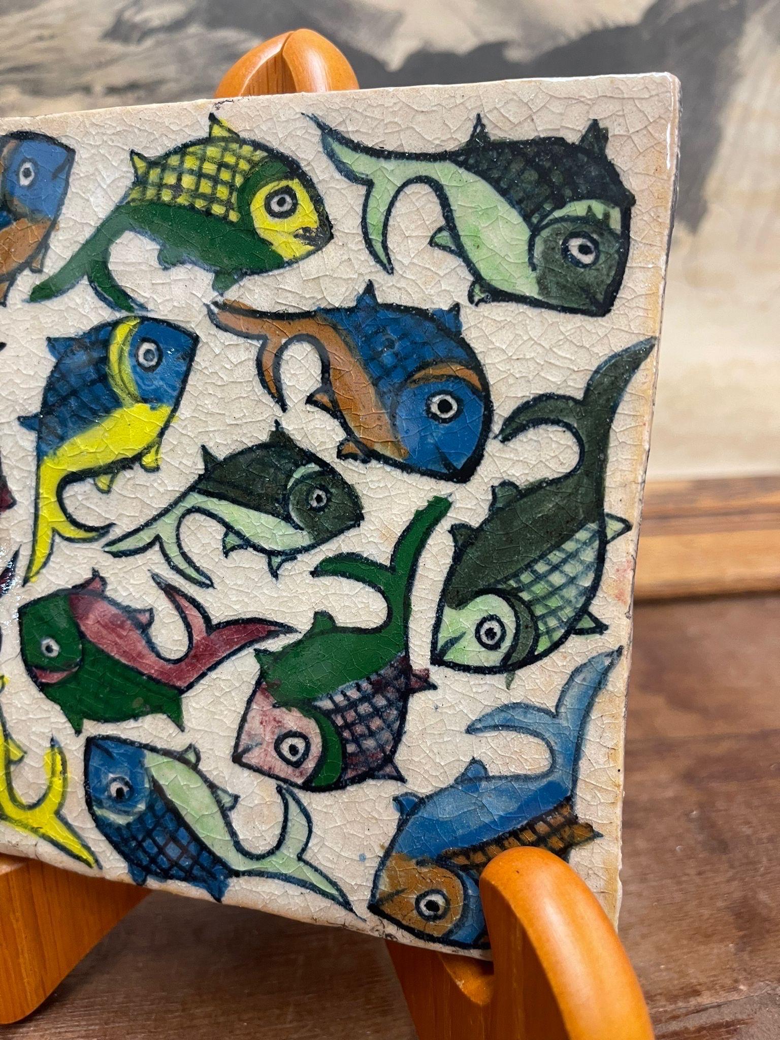 Stone Vintage Hand Painted Italian Tile With Swimming Fish Motif. For Sale
