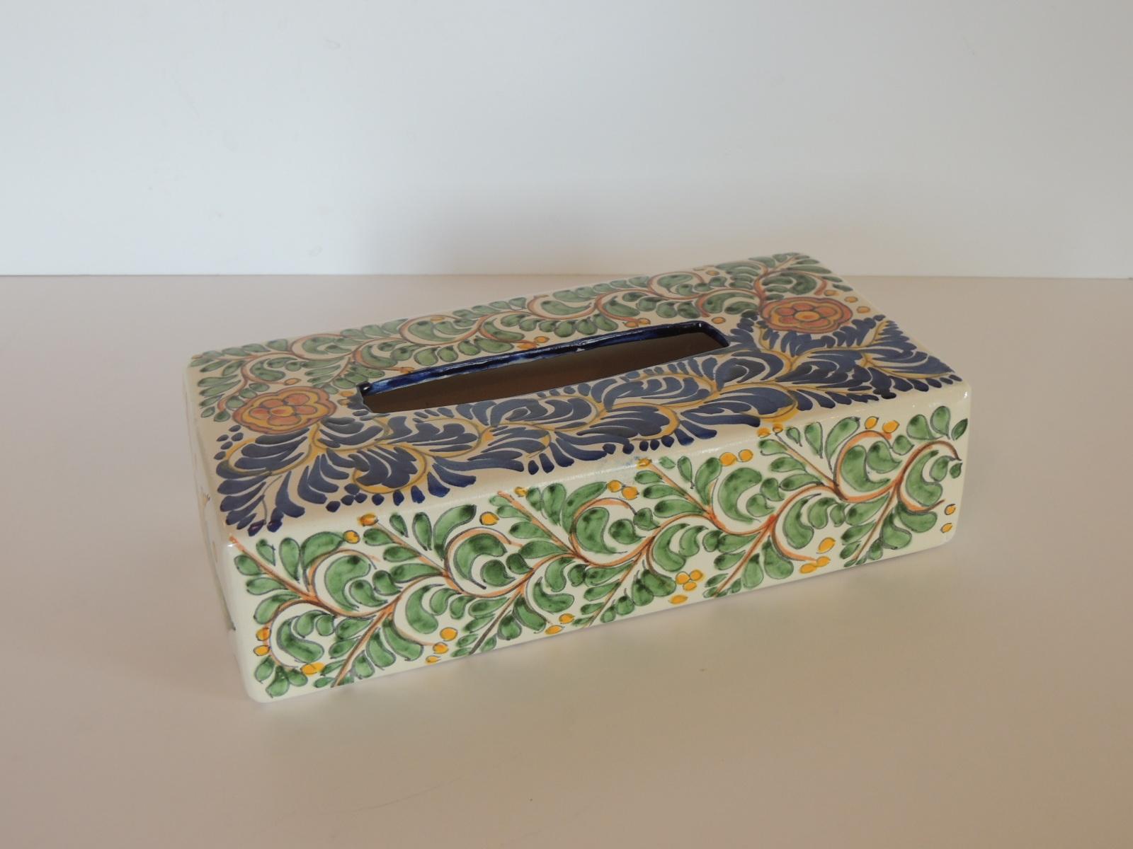 Vintage hand painted Mexican ceramic tissue box cover.
Floral blue and green with orange accents long tissue holder.
(Fits a standard tissue long box)
Size: 10. 1/4