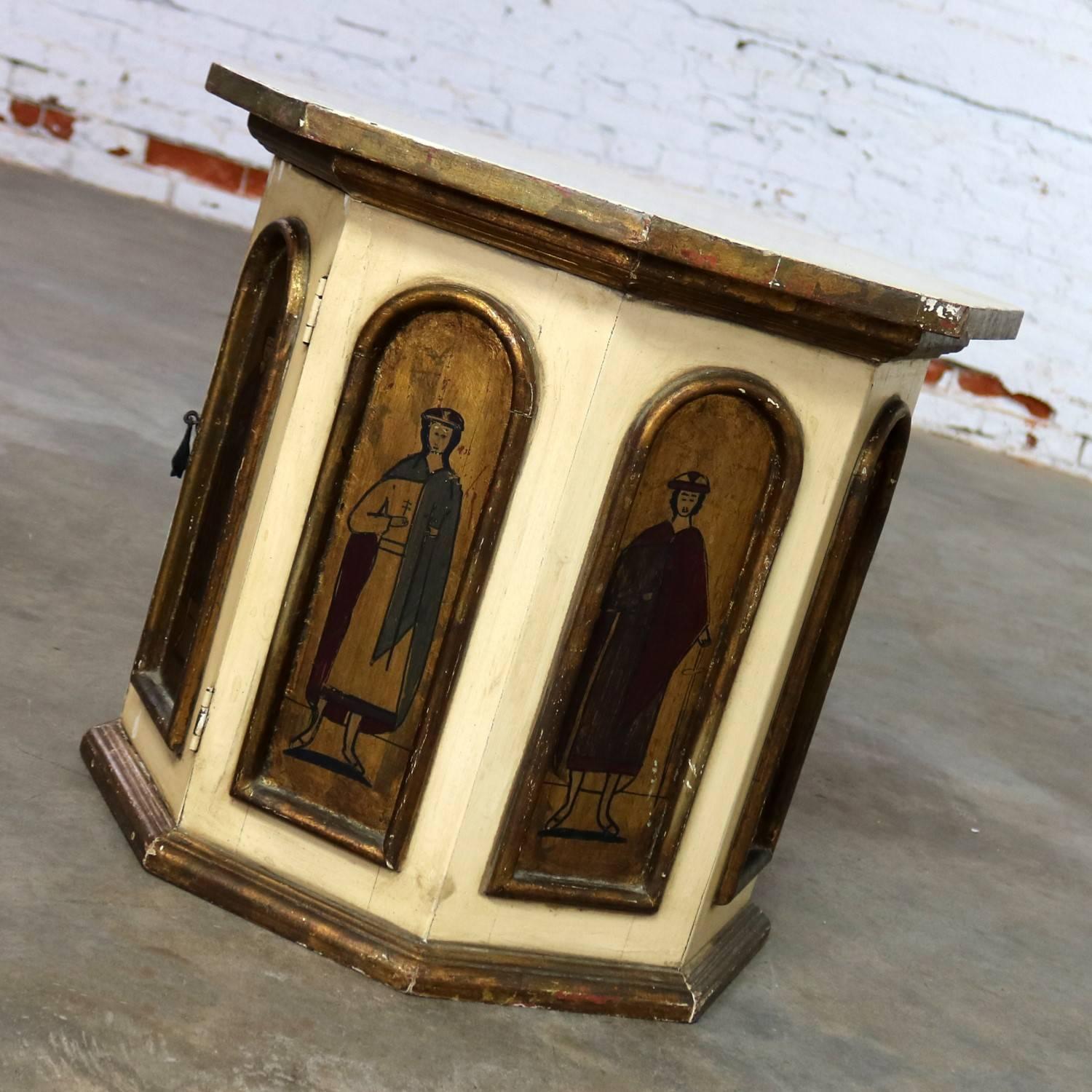 Handsome and useful vintage small octagon shaped drum style side table cabinet with storage behind double doors, hand painted, and attributed to Artes De Mexico Internacionales, SA. This piece has been attributed based upon archived research