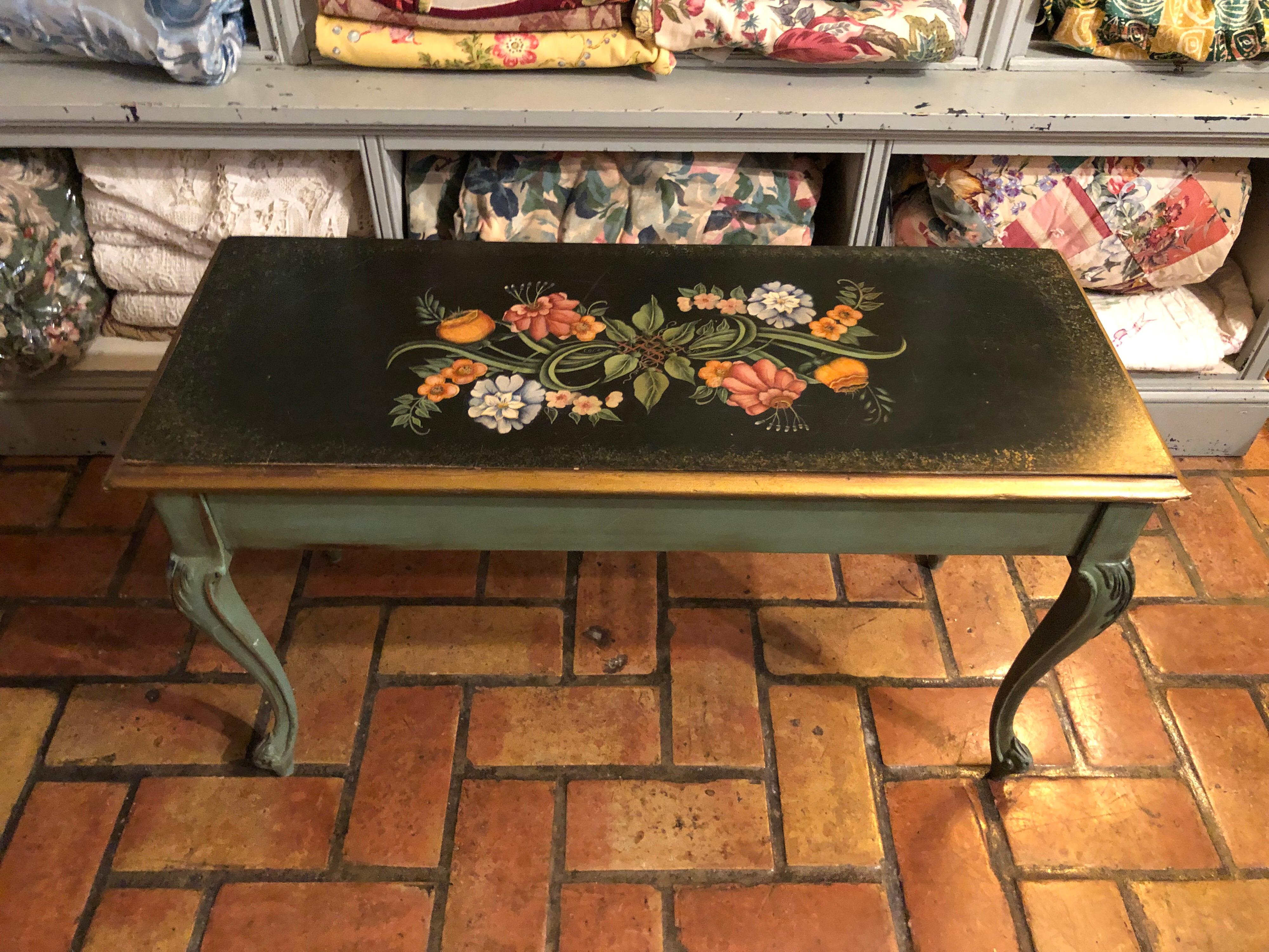 Vintage Hand Painted Piano Bench. Gorgeous floral hand painted top and feminine cabriolet legs. Perfect for at the foot of a bed or piano. Sheet music or magazine storage inside.