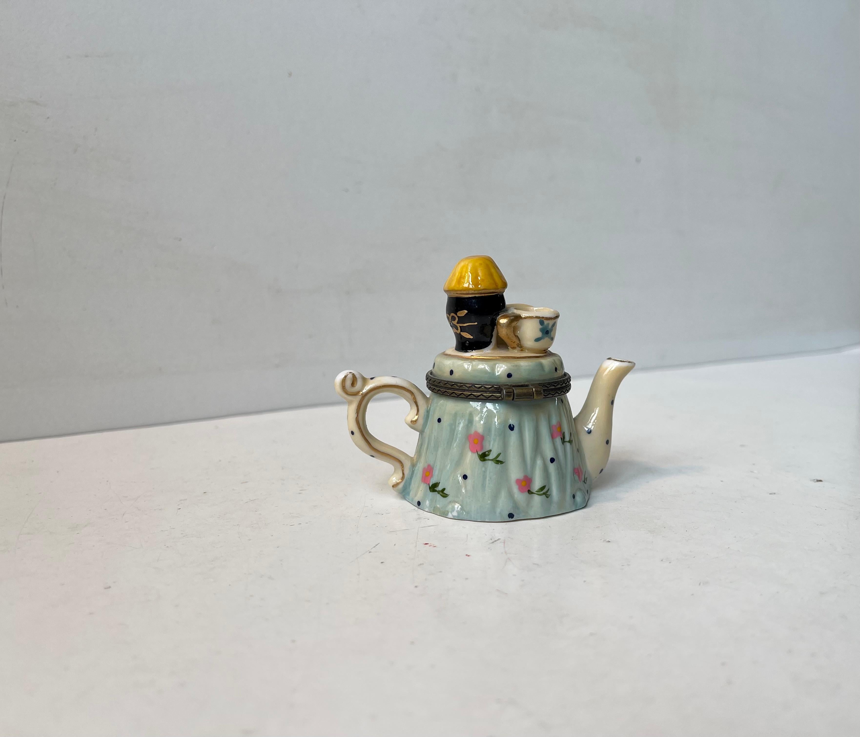 Mid-Century Modern Vintage Hand-Painted Porcelain Teapot Trinket with Black Reader For Sale