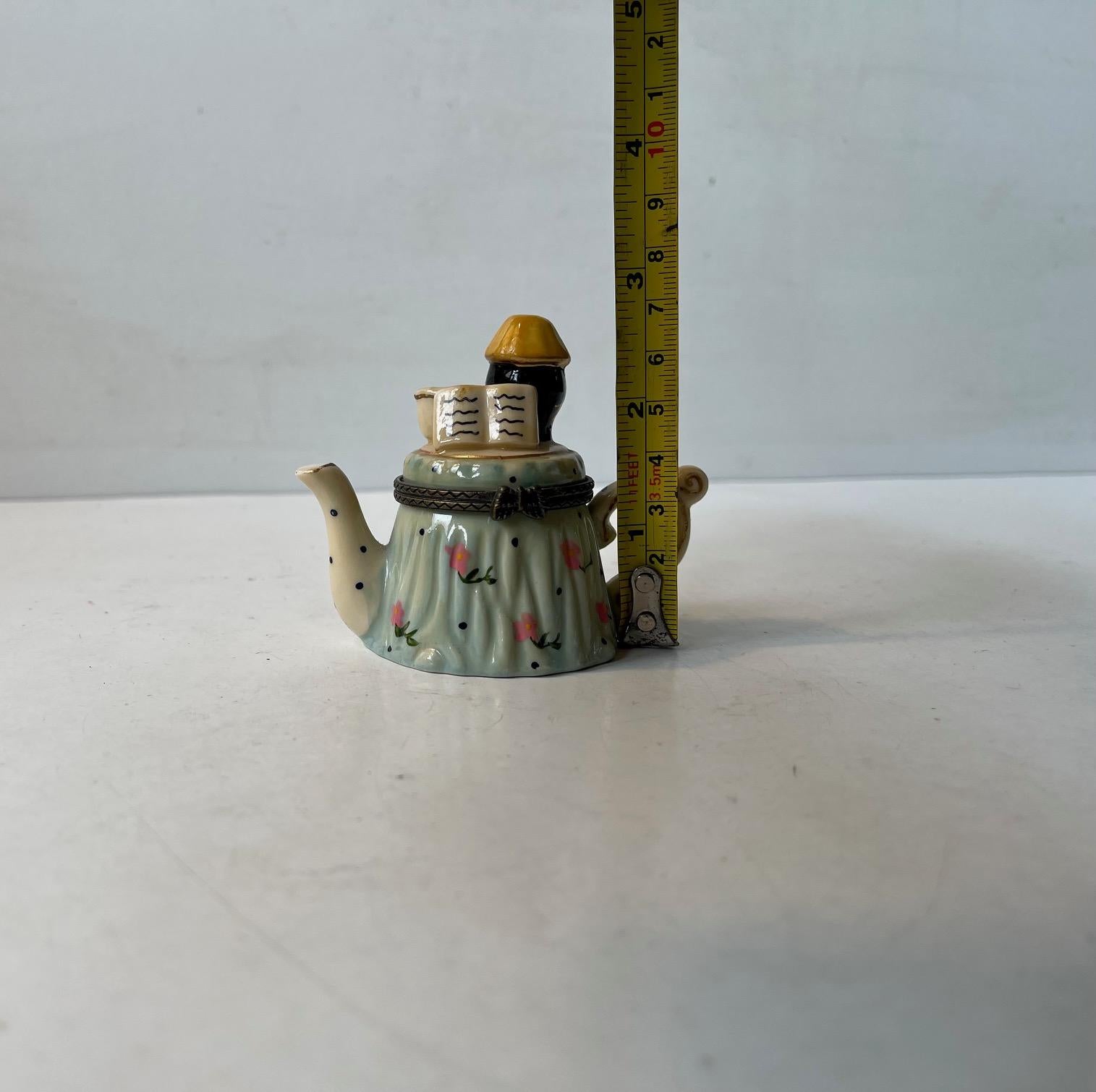 20th Century Vintage Hand-Painted Porcelain Teapot Trinket with Black Reader For Sale