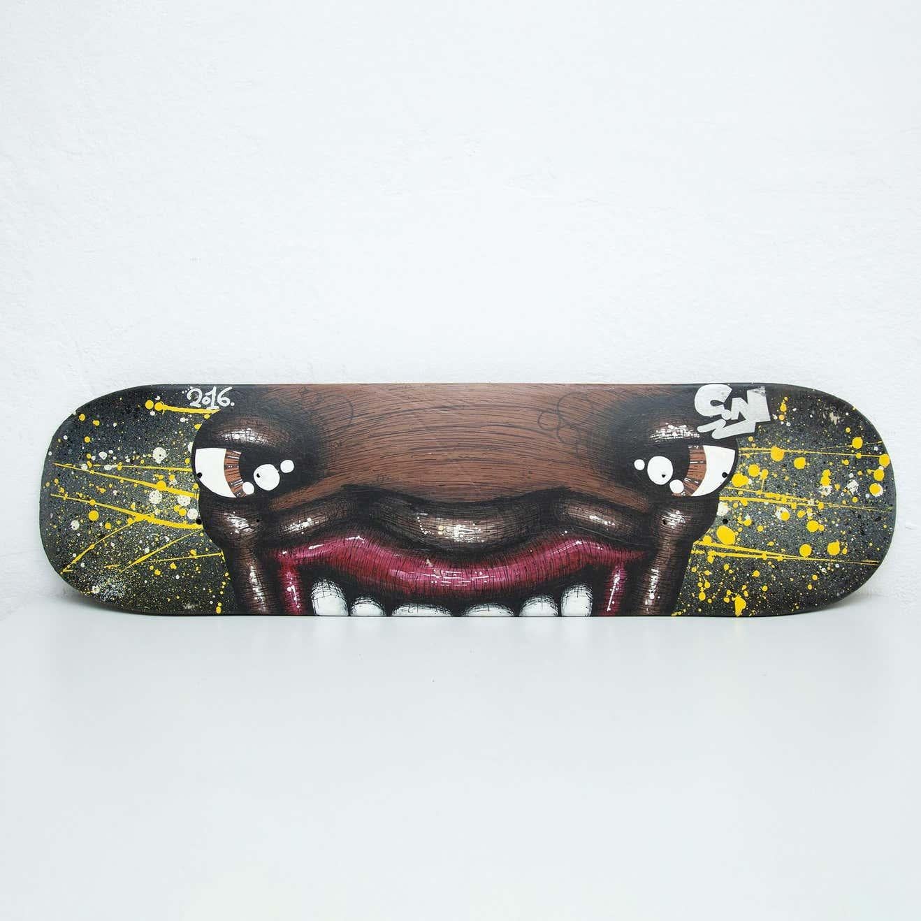 Vintage hand painted skateboard, circa 1989.
In original condition, with minor wear consistent with age and use, preserving a beautiful patina.

Materials:
Wood
Metal

Dimensions:
D cm x W cm x H cm.