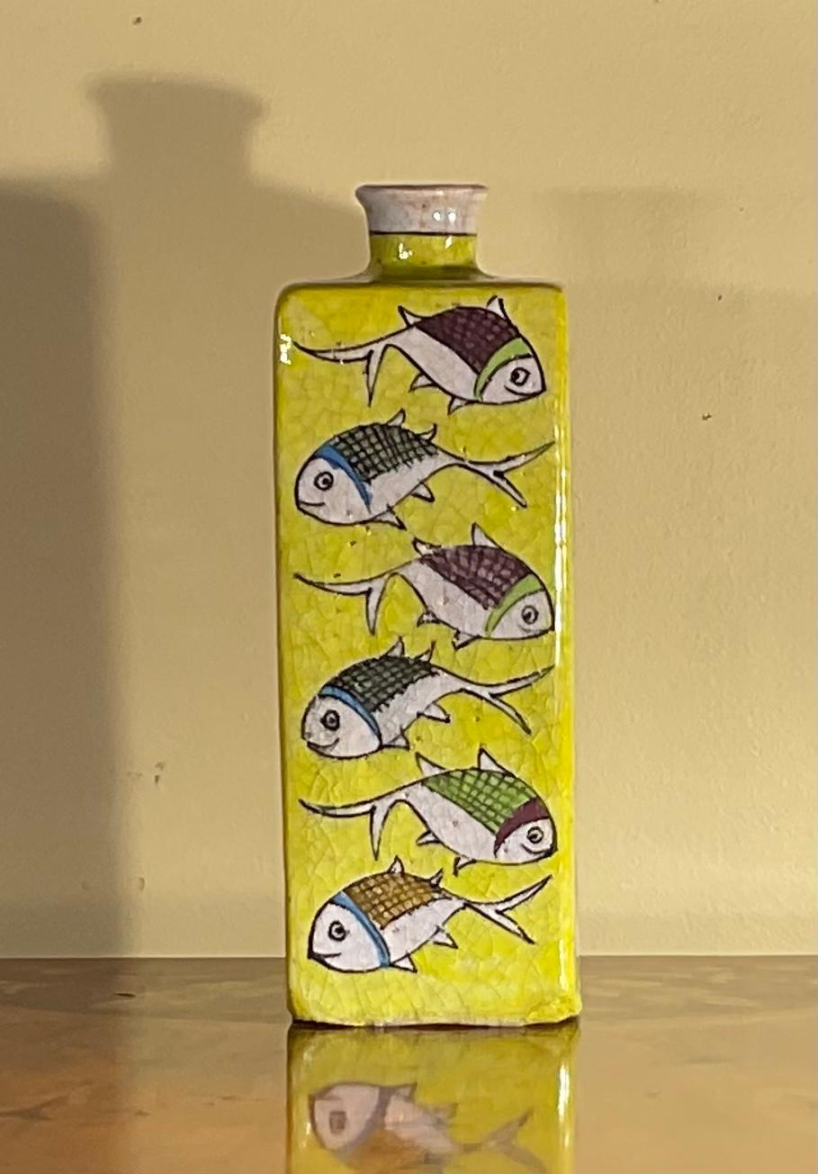 Beautiful Persian ceramic vase hand-painted and glazed with colorful fish motif surrounding on green color background. Great object of art for display.
The opening is 1 inch.
