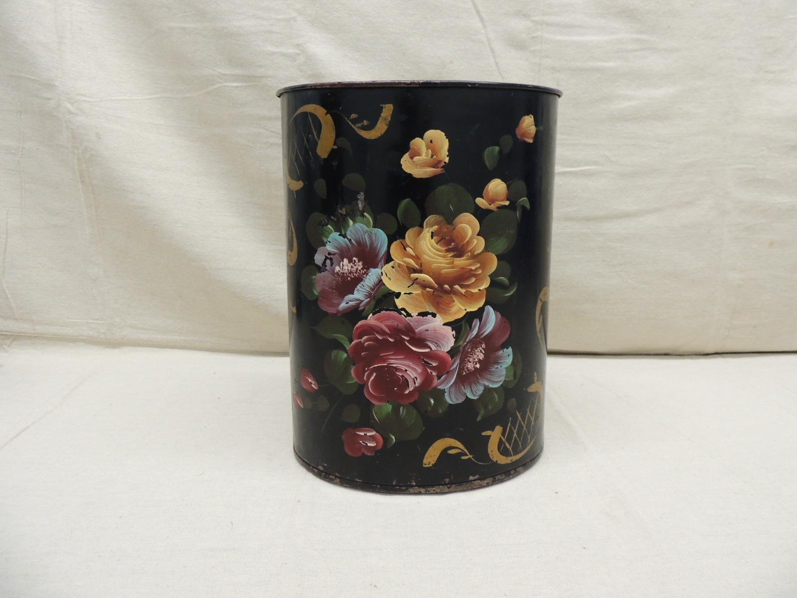 Vintage Hand-painted tole wastebasket
Floral pattern garbage can depicting flowers in bloom.
In shades of black, gold, burgundy, green and blue
Size: 10