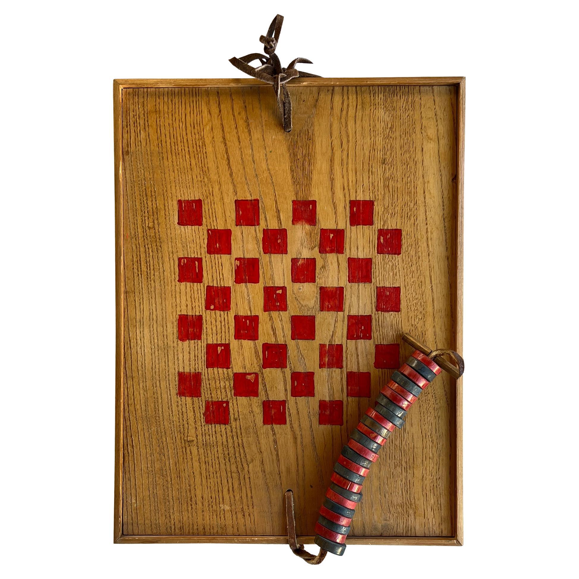 Damier vintage en bois peint à la main avec pièces de jeu rouges et noires d
origine