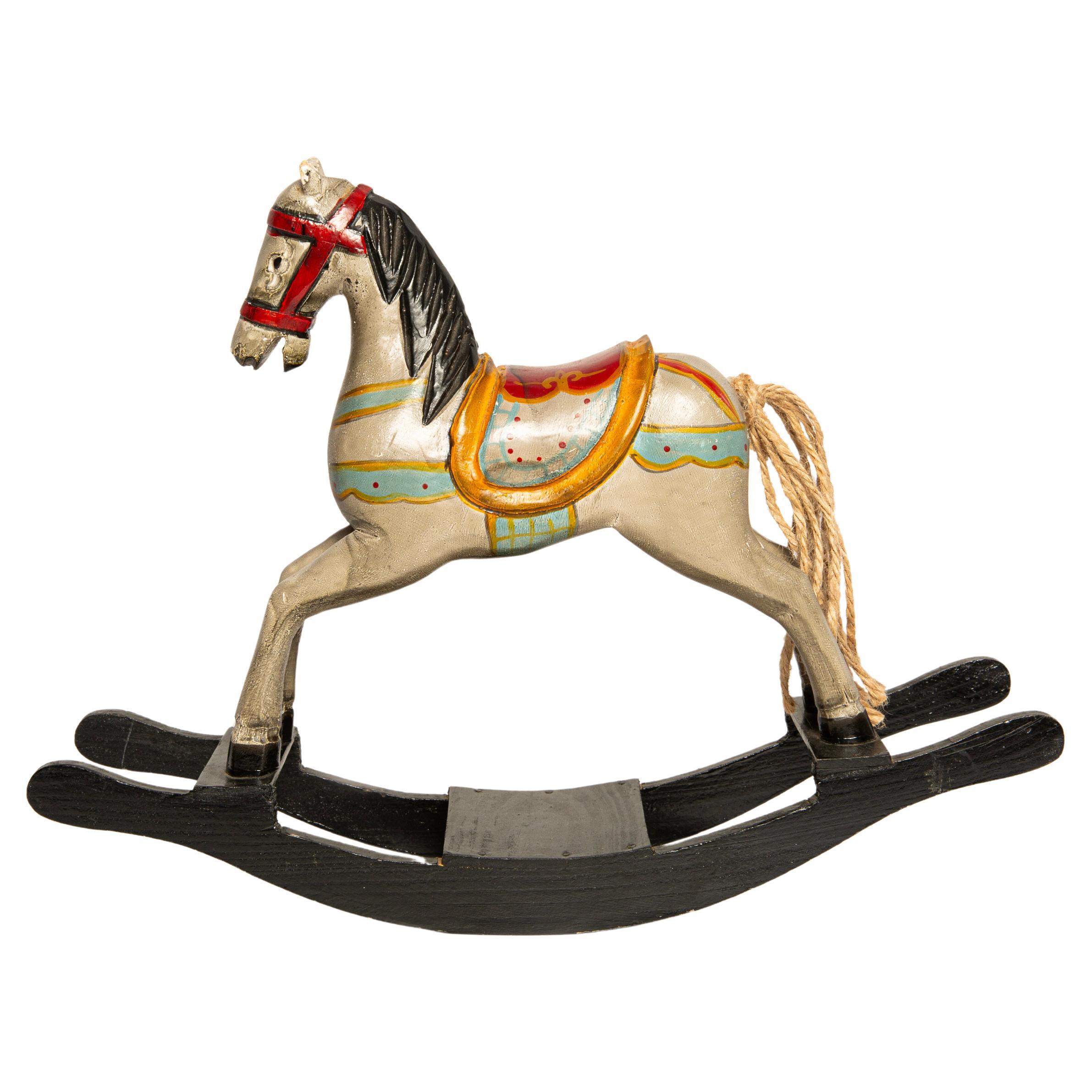 Vintage Hand-Painted Wooden Rocking Horse, Collectible Decor Piece.