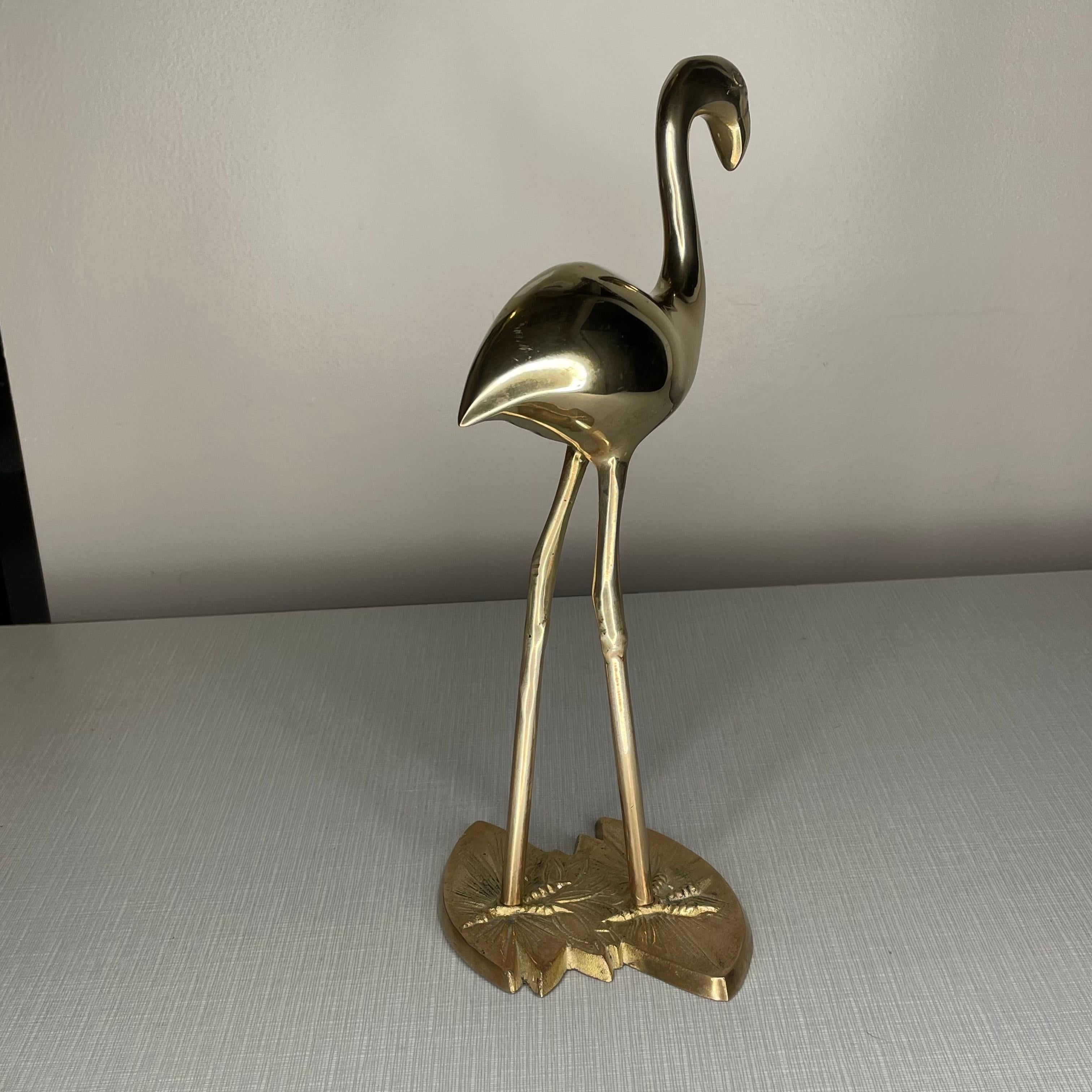Beautiful brass flamingo polished to a mirror finish. This piece is in exceptional condition.