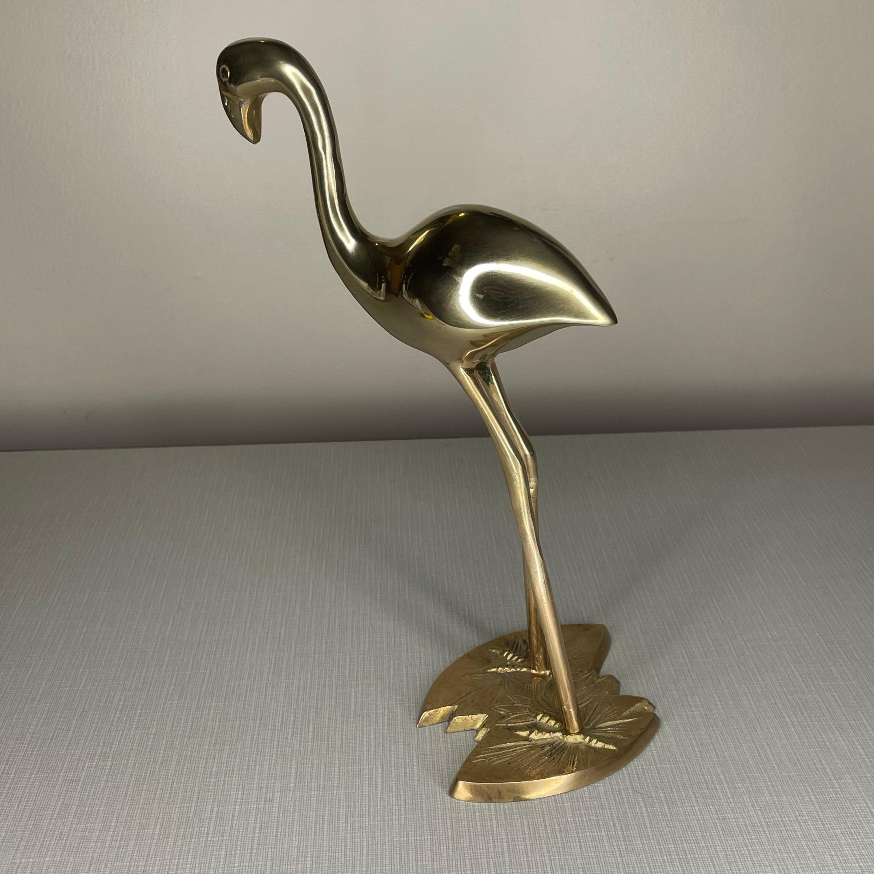 brass flamingo statue