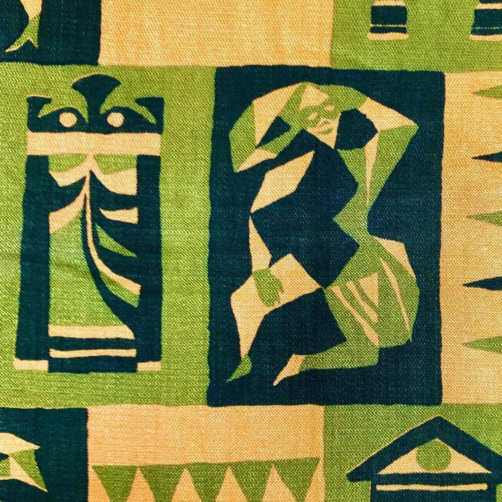 This vintage super soft linen is hand-printed with an abstract repeating dark and light green design of Jesters and Columns on a yellow background. Design by Gayonnes

This fabric could be used to upholster or as clothing. It would even make