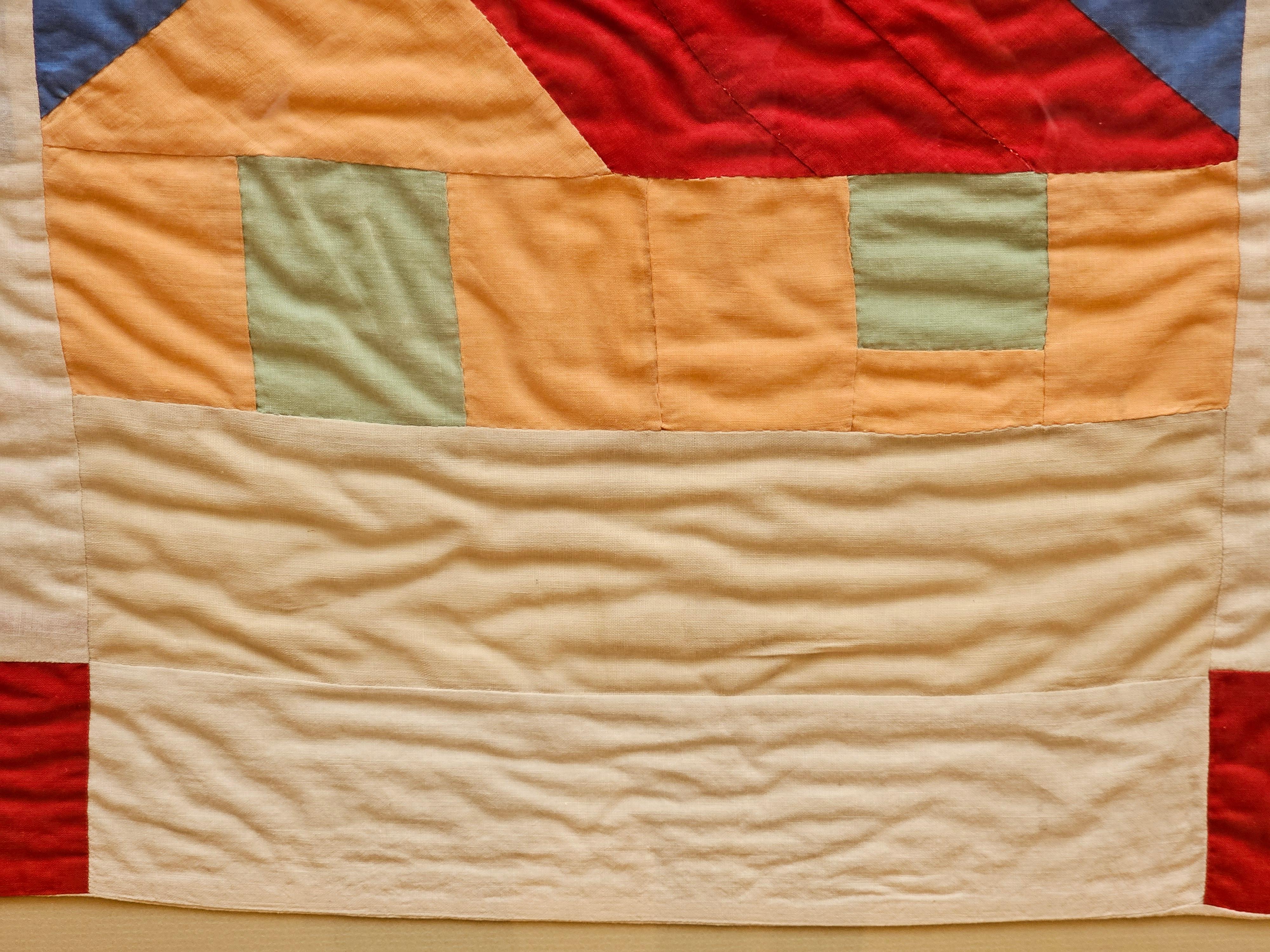 Vintage Hand Stitched Crib Quilt in Red, Green, Peach, Blue Framed as Wall Art For Sale 1