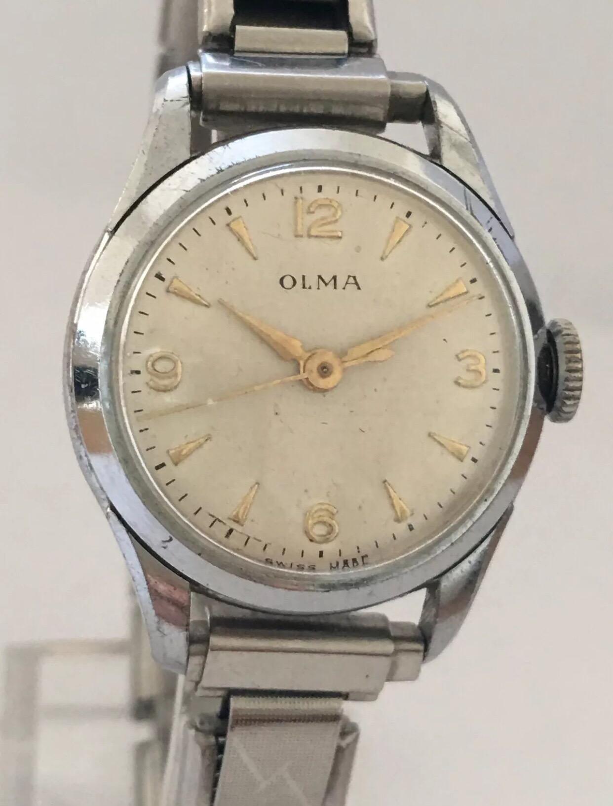 
Vintage Hand-winding Olma Swiss Made Ladies Wristwatch.


This lovely silver plated stainless steel swift seconds watch is working and ticking well.