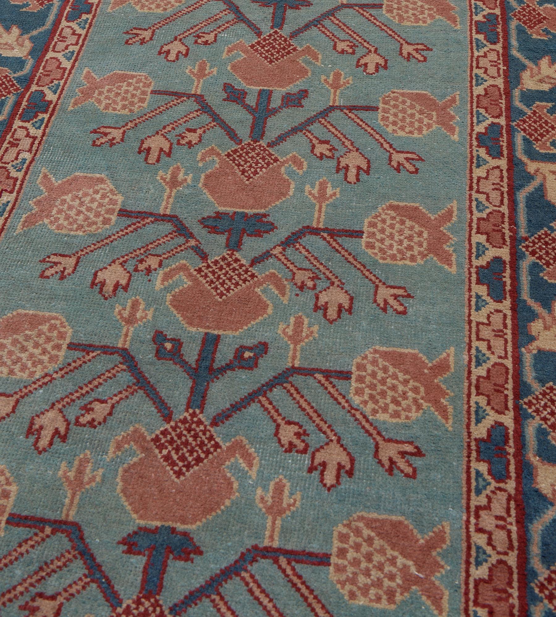Vintage Hand-Woven Floral Pomegranate Pink and Blue Long Khotan Runner In Good Condition For Sale In West Hollywood, CA