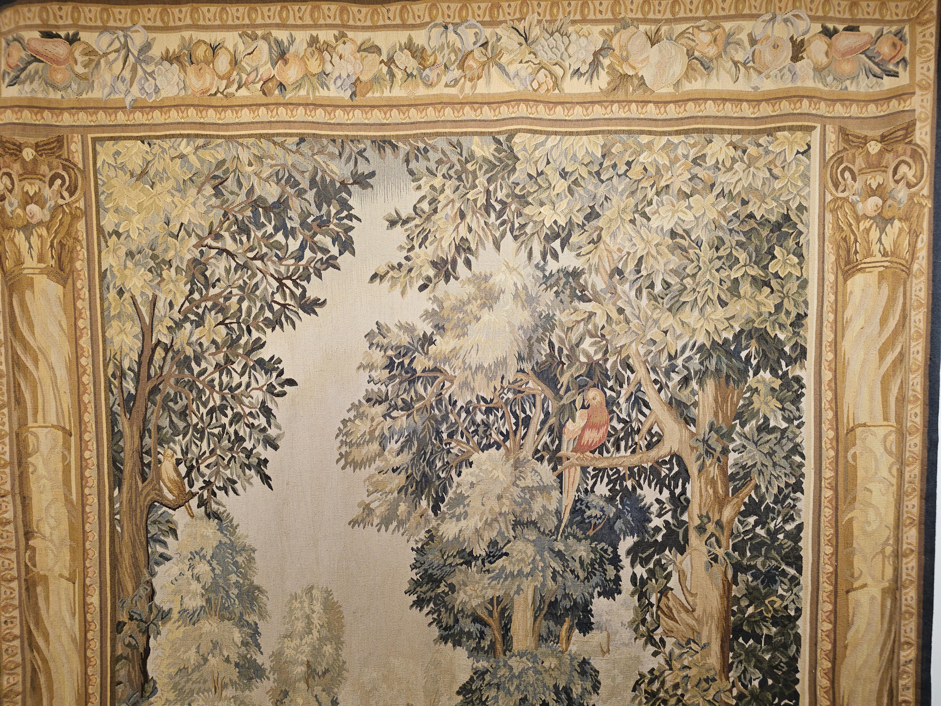 Beautiful French Aubusson Tapestry in the style of 17th century French Aubusson Verdure tapestries hand-woven in the 20th century in France.  The nature scene depicts birds on tree branches in a tranquil forest scene.  The colors include various
