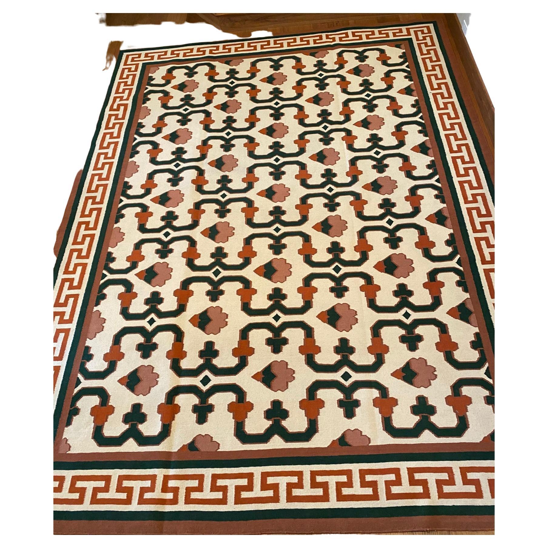20th. c. Vintage hand-woven kilim rug. A crisp and sophisticated design with a Greek key border, this kilim has a striking colorway; ochre, forest green, orange and off white. Perfect for a garden room, office, library or dining room.

Kilim rugs
