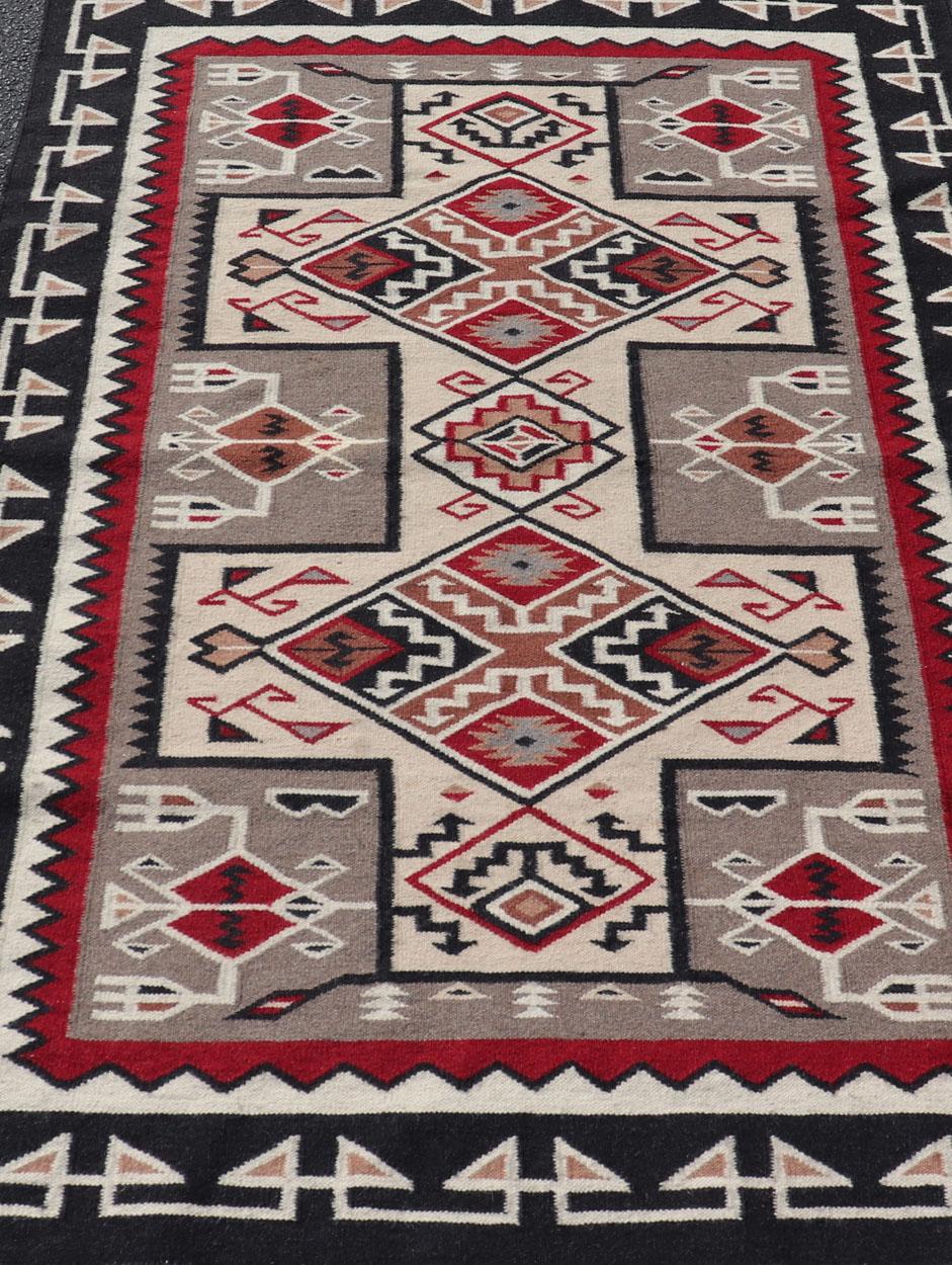 Vintage Hand Woven Navajo Design Rug in Gray, Ivory, Black, and Red In Excellent Condition For Sale In Atlanta, GA