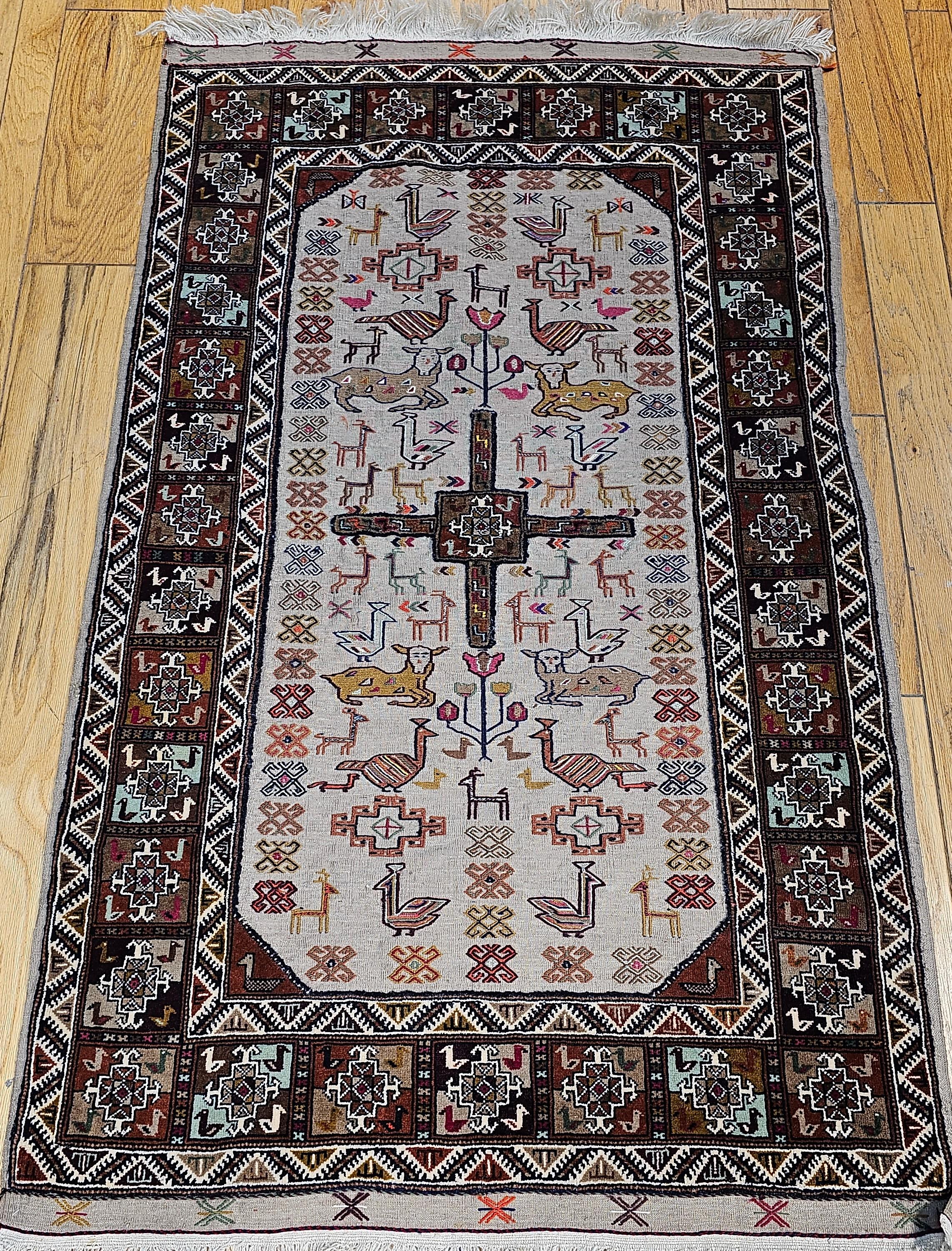 Extremely rare and very collectable Qashqai tribal tapestry hand-woven rug in the “Tree of Life” pattern. This tapestry rug is unique in several ways.  First there are two  different woven techniques used in the creation of this tribal art.  The