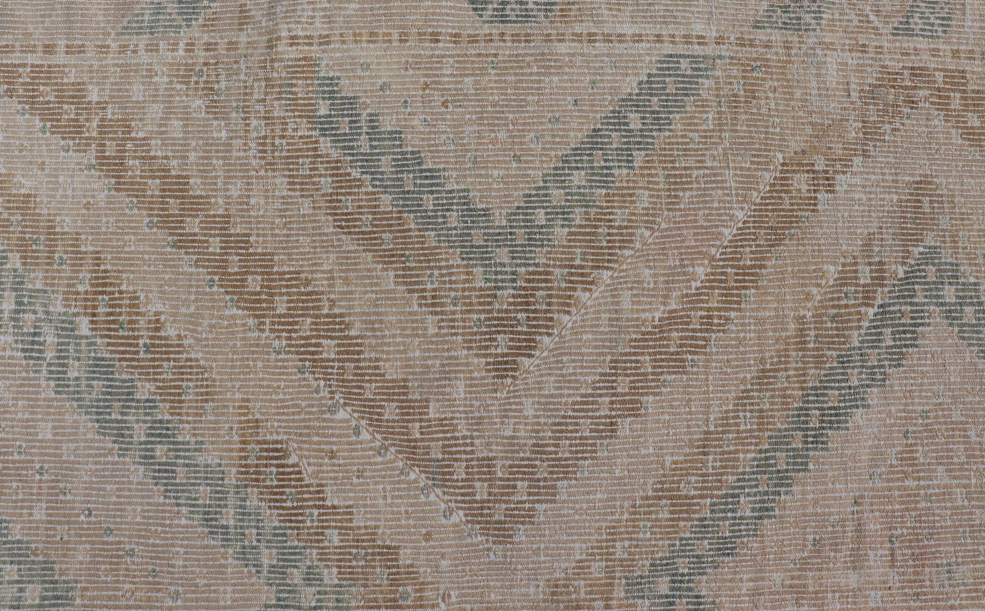 This flat-weave tribal Turkish kilim has been hand-woven in wool. The rug features an all-over sub-geometric diamond design, and is rendered in blue and earthy tones; making this rug a superb fit for a wide variety of interiors.
 
Vintage Kilim