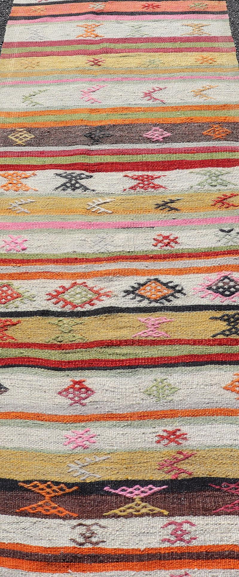 Wool Vintage Hand Woven Turkish Kilim Colorful Stripe Runner with Tribal Motifs For Sale