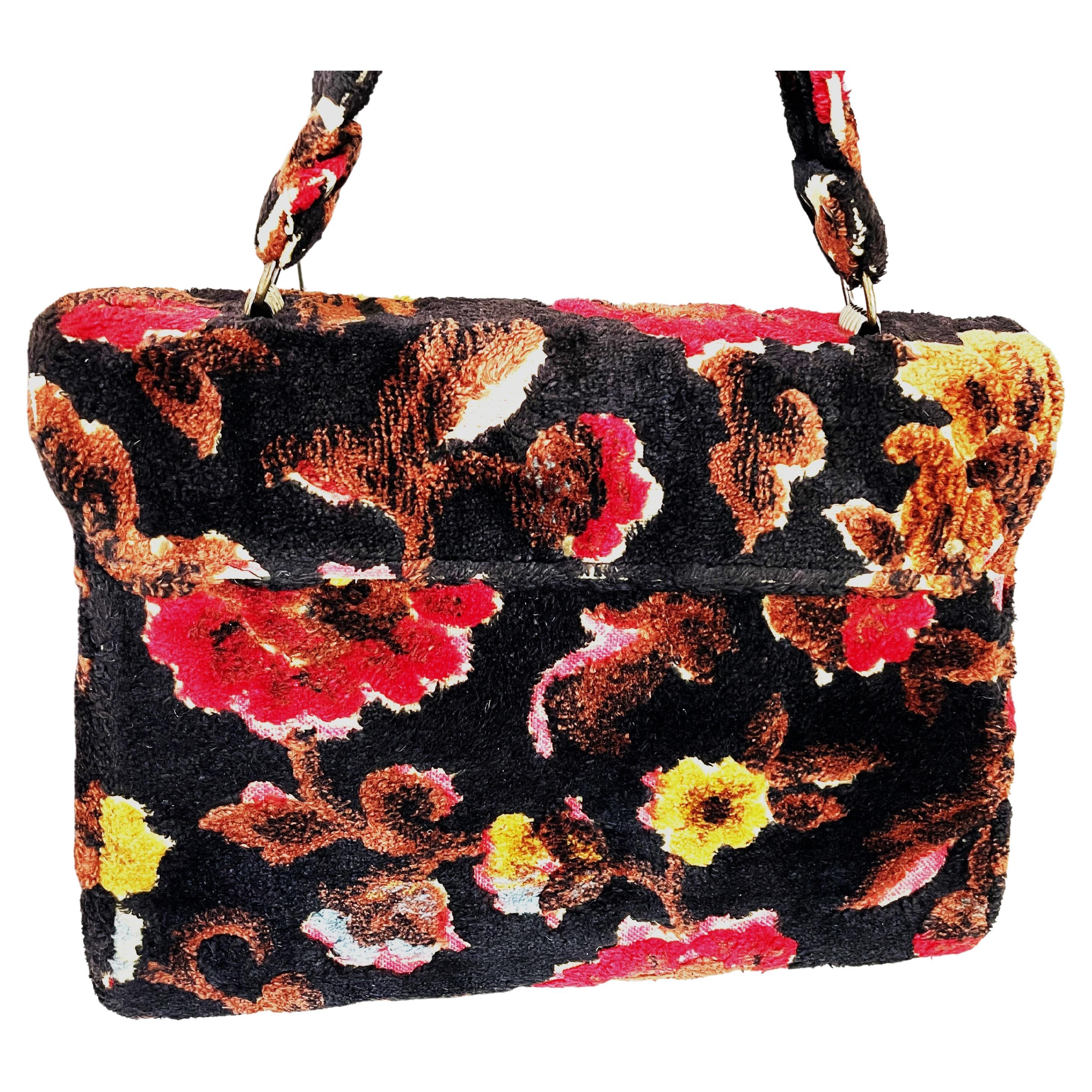 This timeless collectable from the 1950s is an oversized, eyecaticng statement piece that adds a hint of tastful clamur to any ensable. Suptous cut velvet - chenille fabric in mult-lined jewel tones over black gives this classic handbag a subtile,
