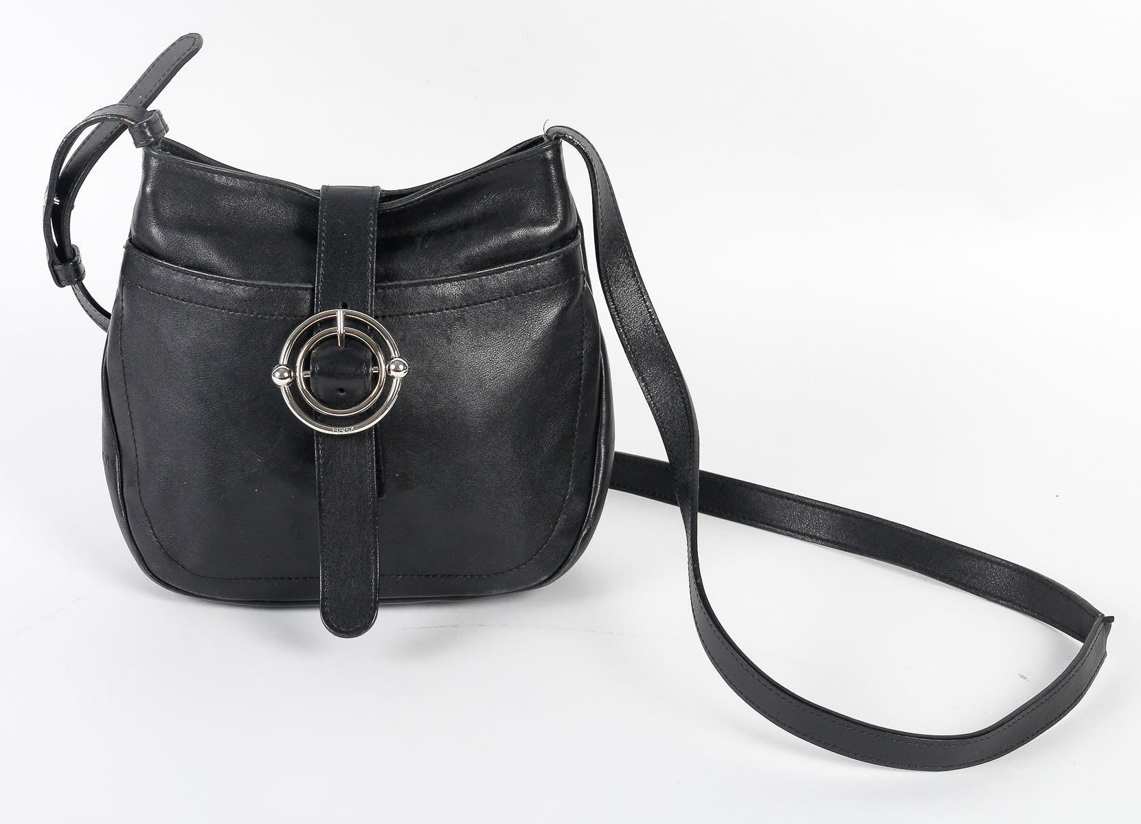 Vintage Handbag, Furla, Made in Italy, Black Leather, XXth century.

Handbag by Furla, black leather, made in Italy, silver buckle, very good condition, 20th century.    
h: 22cm , w: 22cm, d: 9cm