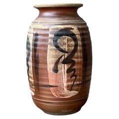 Vintage Handcrafted Ceramic Vase with Abstract Motif