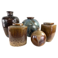 Vintage handcrafted pottery vase collection