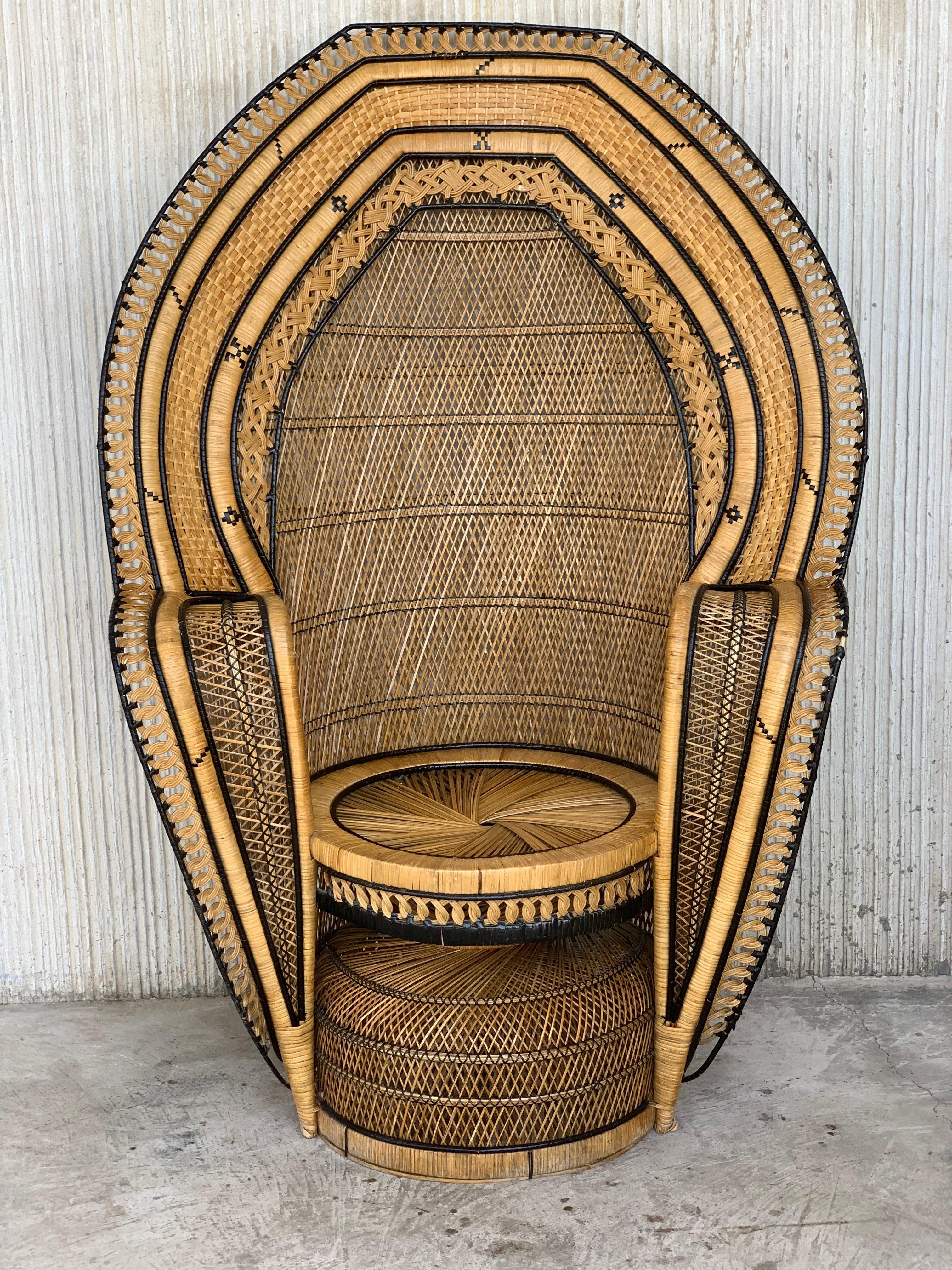 Stunning handwoven vintage peacock chair from the 1970s.
Please note the details and different techniques in this chair. 
Made out of wicker, rattan and reed.
Great for indoor and outdoor use.

Measures: Seat & cushion diameter 21in.