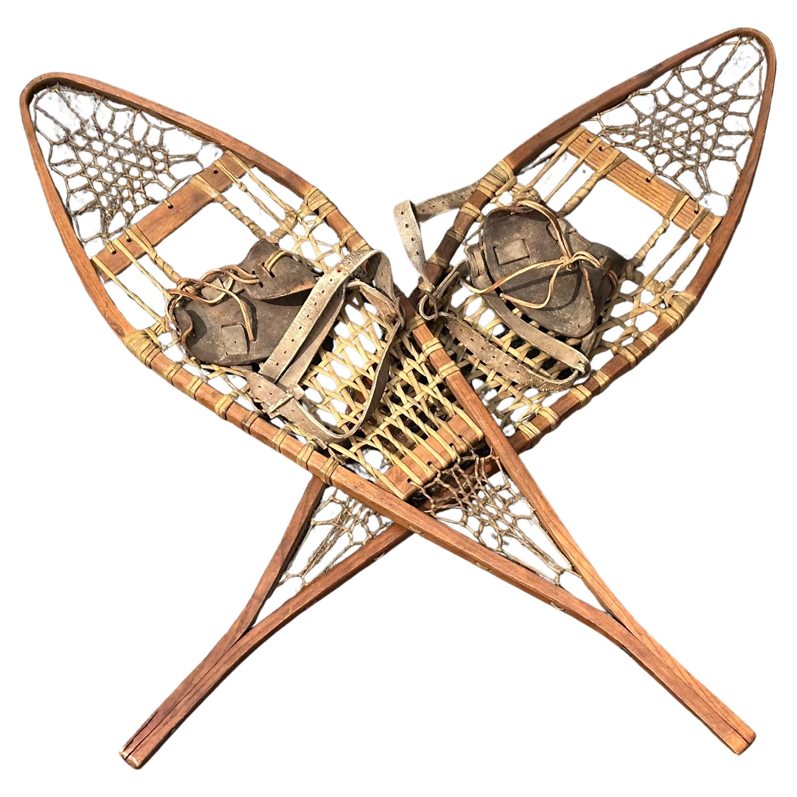 Vintage Handcrafted Wooden Snowshoes with Rawhide Webbing 
Leather Bindings