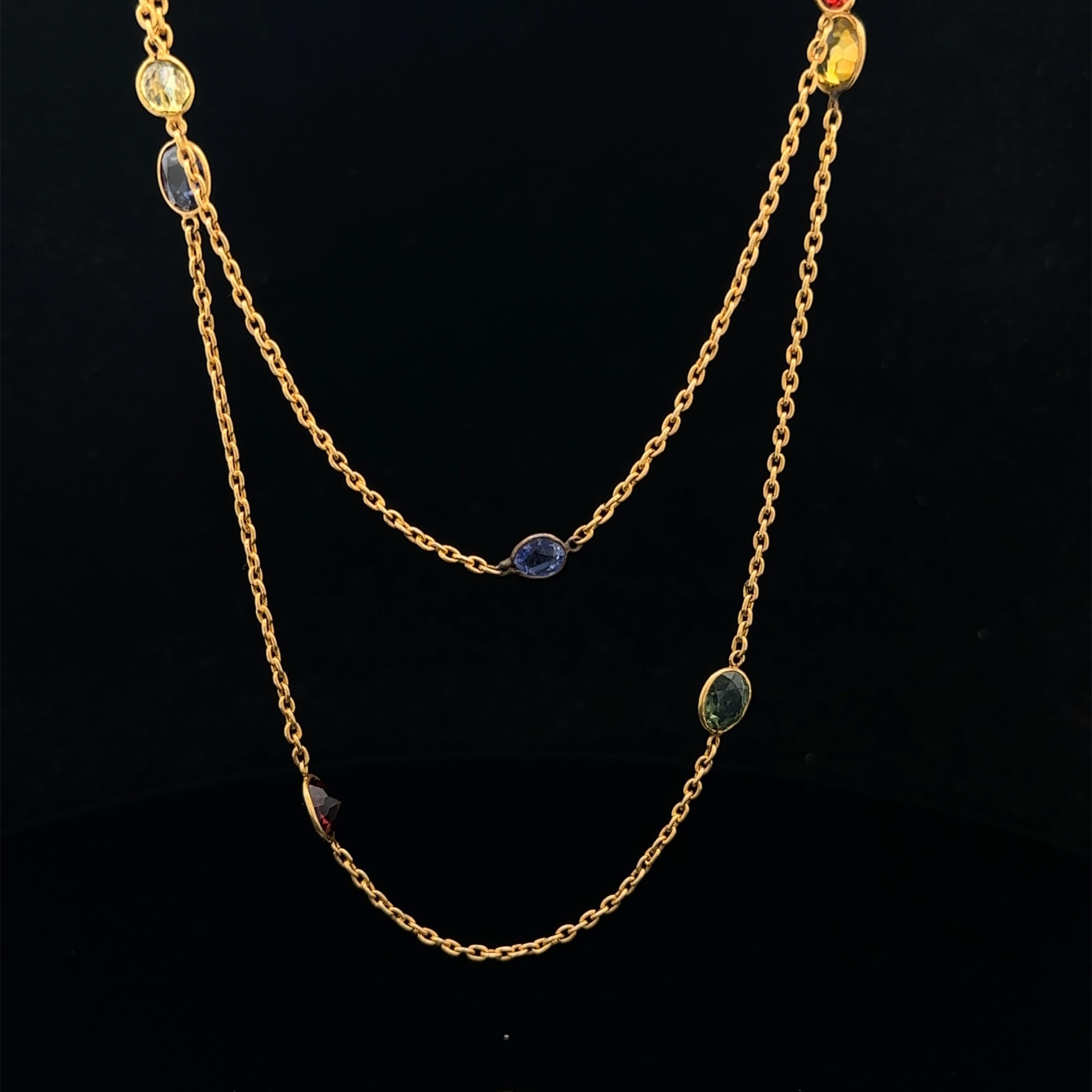 --Pierre(s) :...
Nombreuses pierres naturelles véritables - dont le saphir - taille ronde et ovale - serties - couleurs vives et pastel

MATERIAL : Chaîne en or jaune 14k massif, lunette en or 14k faite à la main
Poids : 10,47 grammes
Type de chaîne