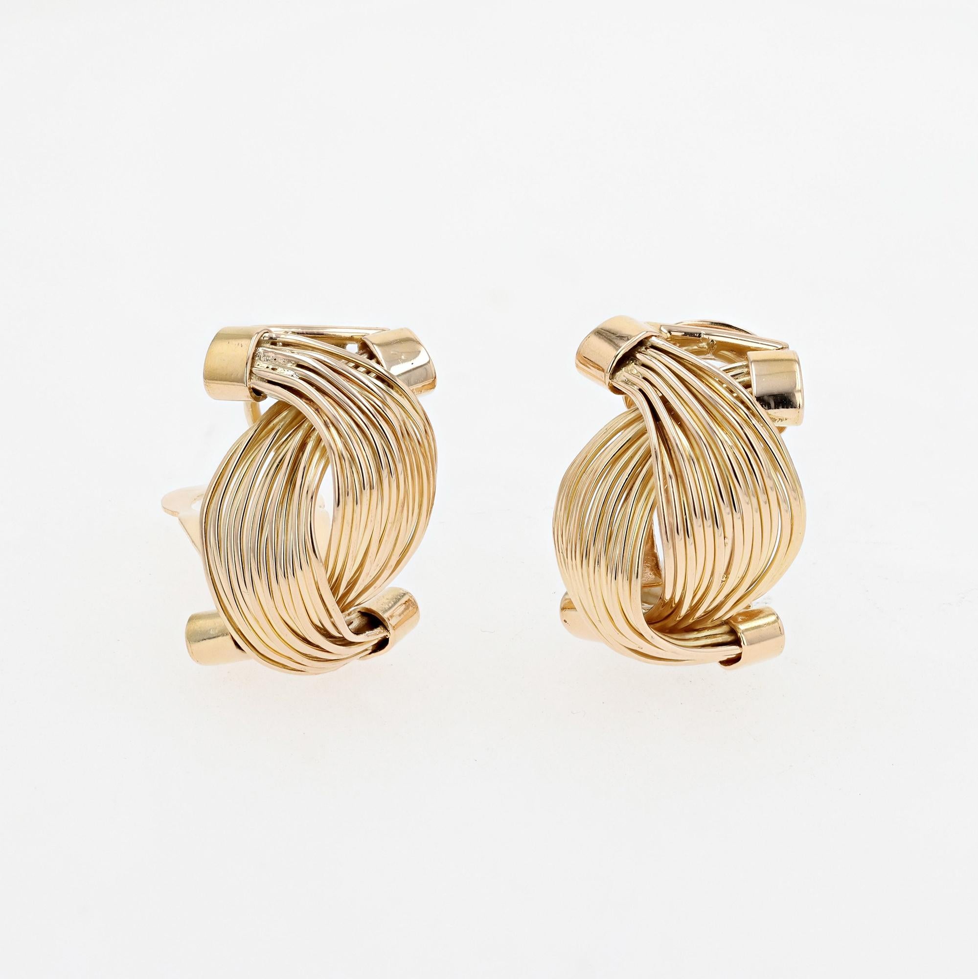 Vintage 18 Yellow Gold  Post War (circa 1950s) handmade sculptural wire wrap swirl ear clips
with posts and Omega backs.  Hallmarked (14.5 grams).  Complimentary bracelet is being sold as well.
