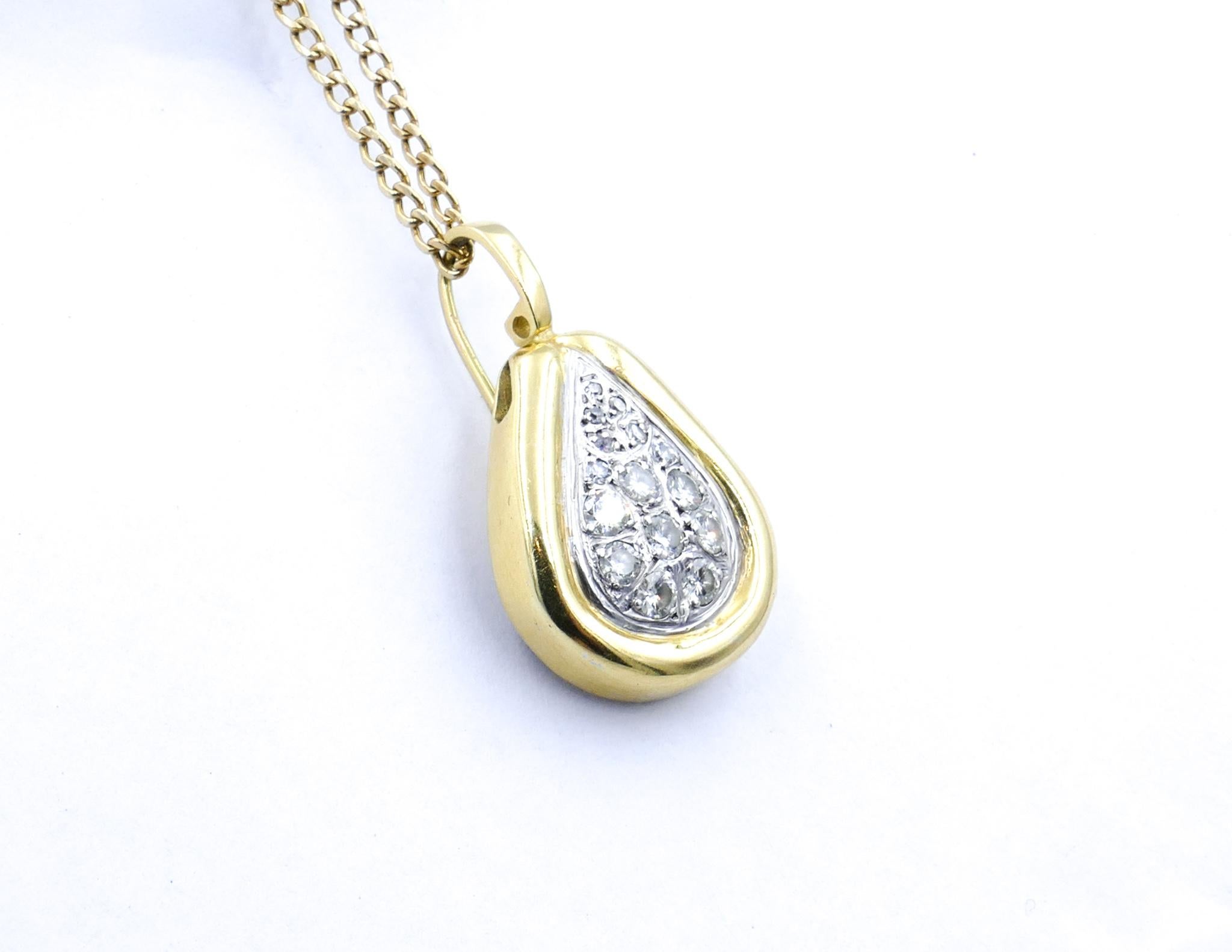 The quality of the Diamonds in this very functional Pendant/Enhancer range from F to H & total just on 1 carat.
 It is a most attractive jewellery Item designed & made probably in the late 30's early 40's, is set with the Diamonds ringed by White
