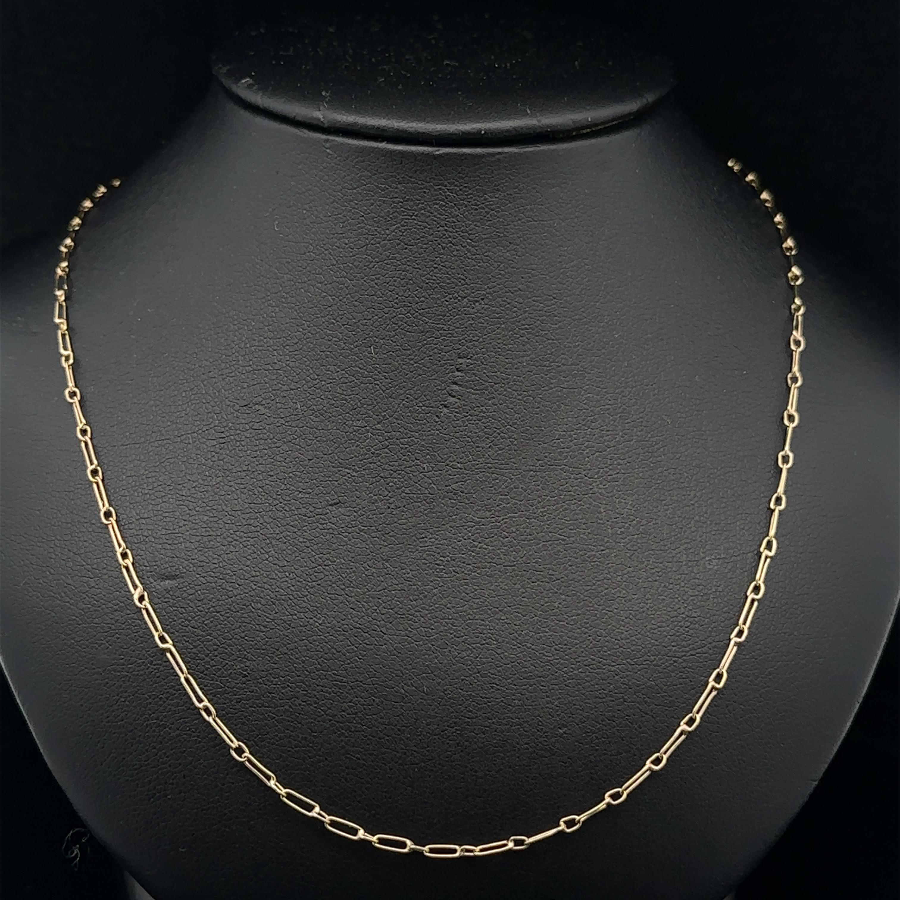 MATERIAL : Or jaune 18k massif 
Poids : 2.68 grammes
Type de chaîne : Maillon ouvert
Longueur de la chaîne : 19 pouces (mesurée à côté de la règle)
Largeur de la chaîne : 1.5mm (0.06