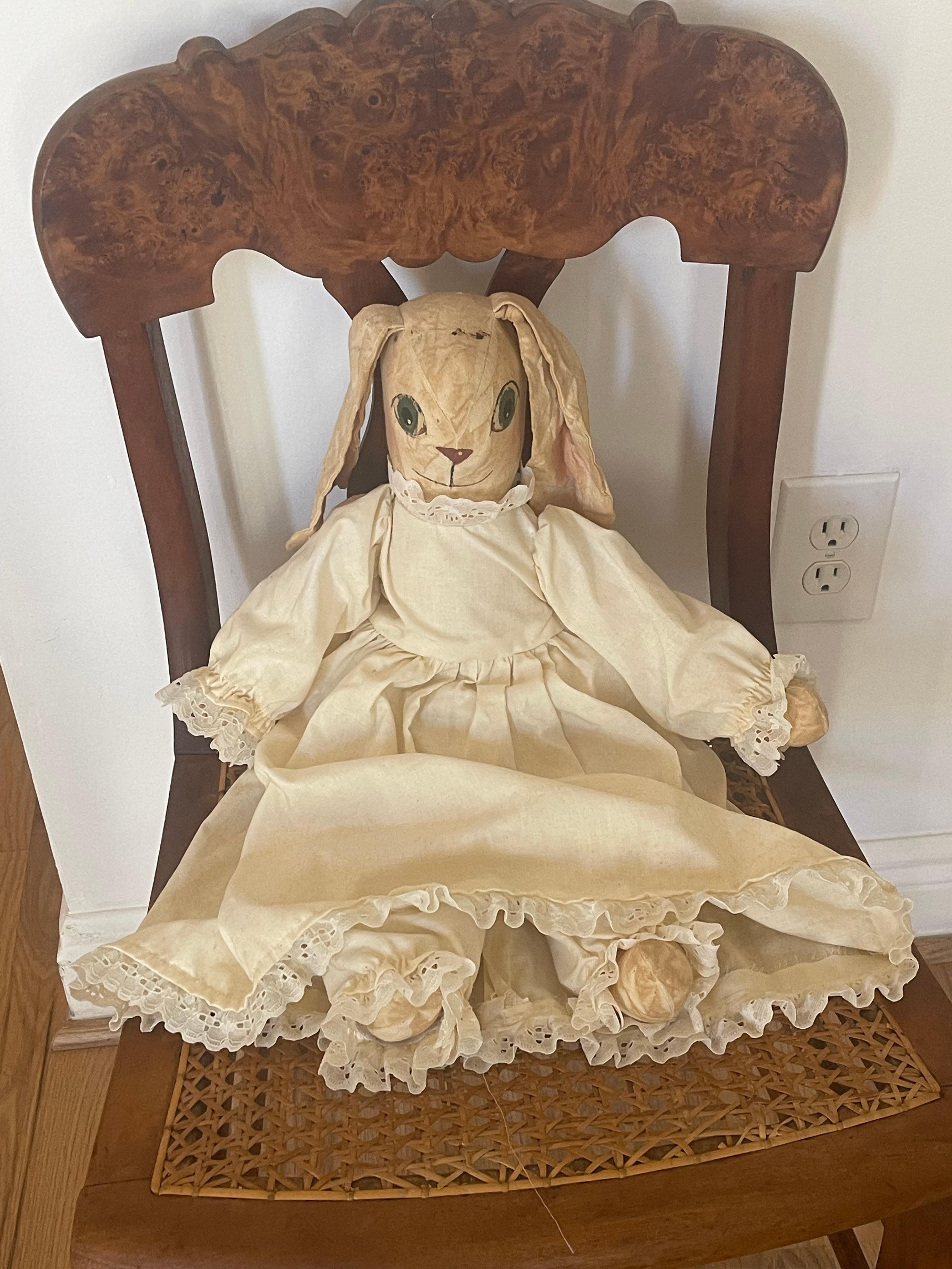 Rare unique handmade vintage Bunny Rabbit doll all dressed up in long cotton dress . Great collectible toy doll.