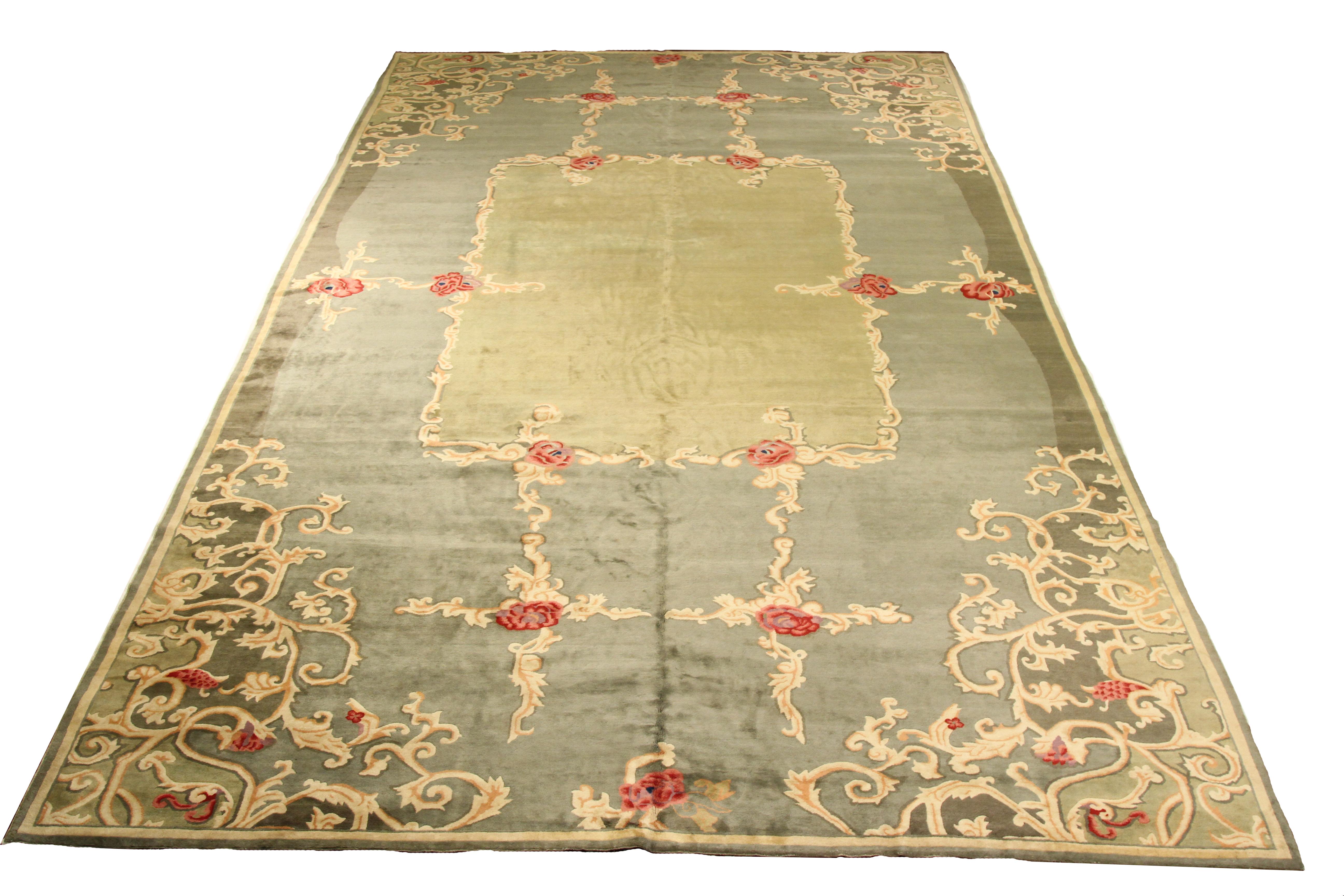 Antique handmade Chinese area rug made from fine wool and all-natural vegetable dyes that are safe for people and pets. This beautiful piece features a rich field of floral details in bright colors that was so popular in the 1920s when the Art Deco