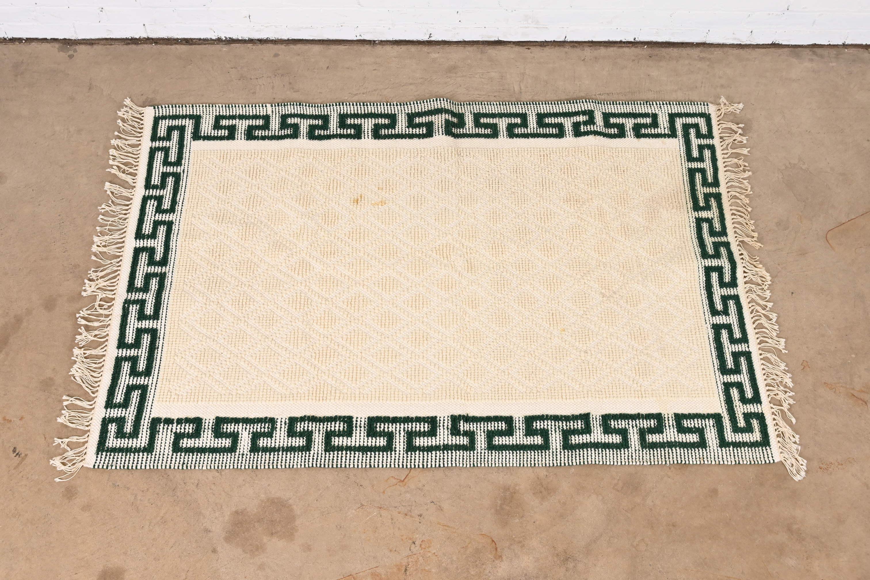 cream rug with border