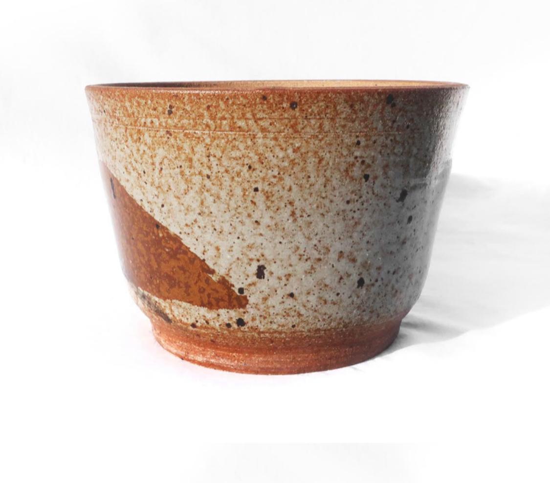 Beautiful handmade glazed earthenware planter in tan, brown, orange and black with landscape decoration.

In excellent condition with drainage hole.

Measures: 9” x 9” x 6.5”.
 