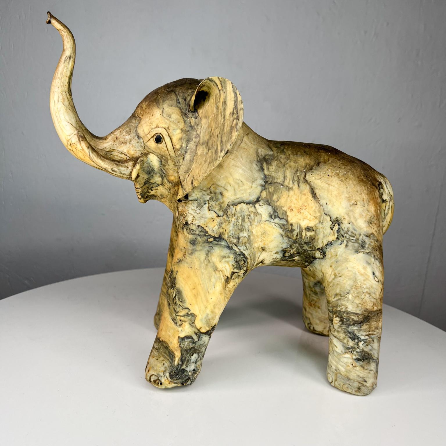 Handmade elephant sculpture oyster shell Art.
Measures: 12 tall x 12.25 deep x 5.5 wide.
Preowned original vintage condition.
See images provided.