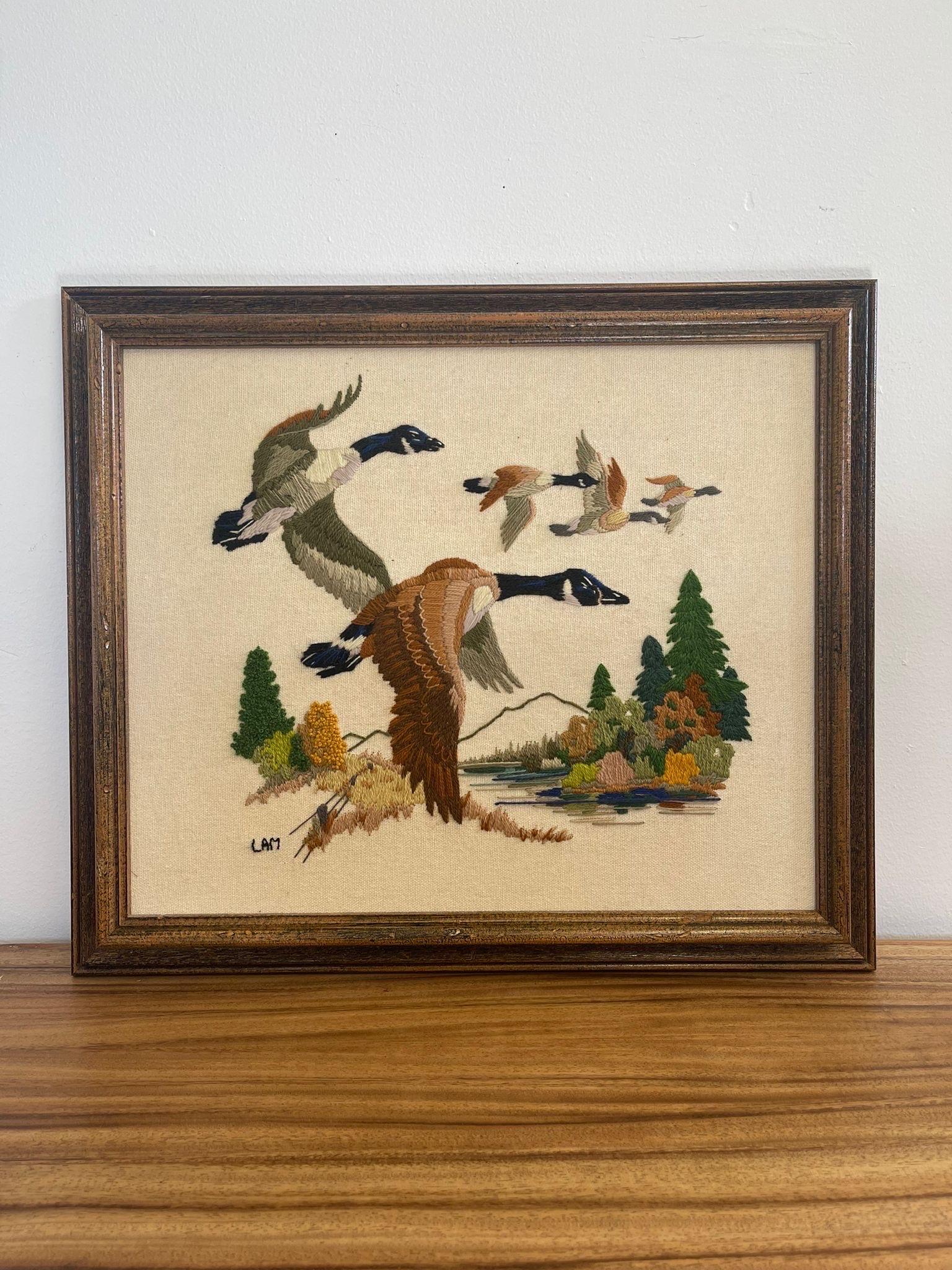 This Artwork was from an embroidery kit in 1978 titled “ Autumn Flight “ from sunset Stitchery. Image of geese flying over forests. Vintage Condition Consistent with Age as Pictured.

Dimensions. 23 W ; 1/4 D ; 30 H