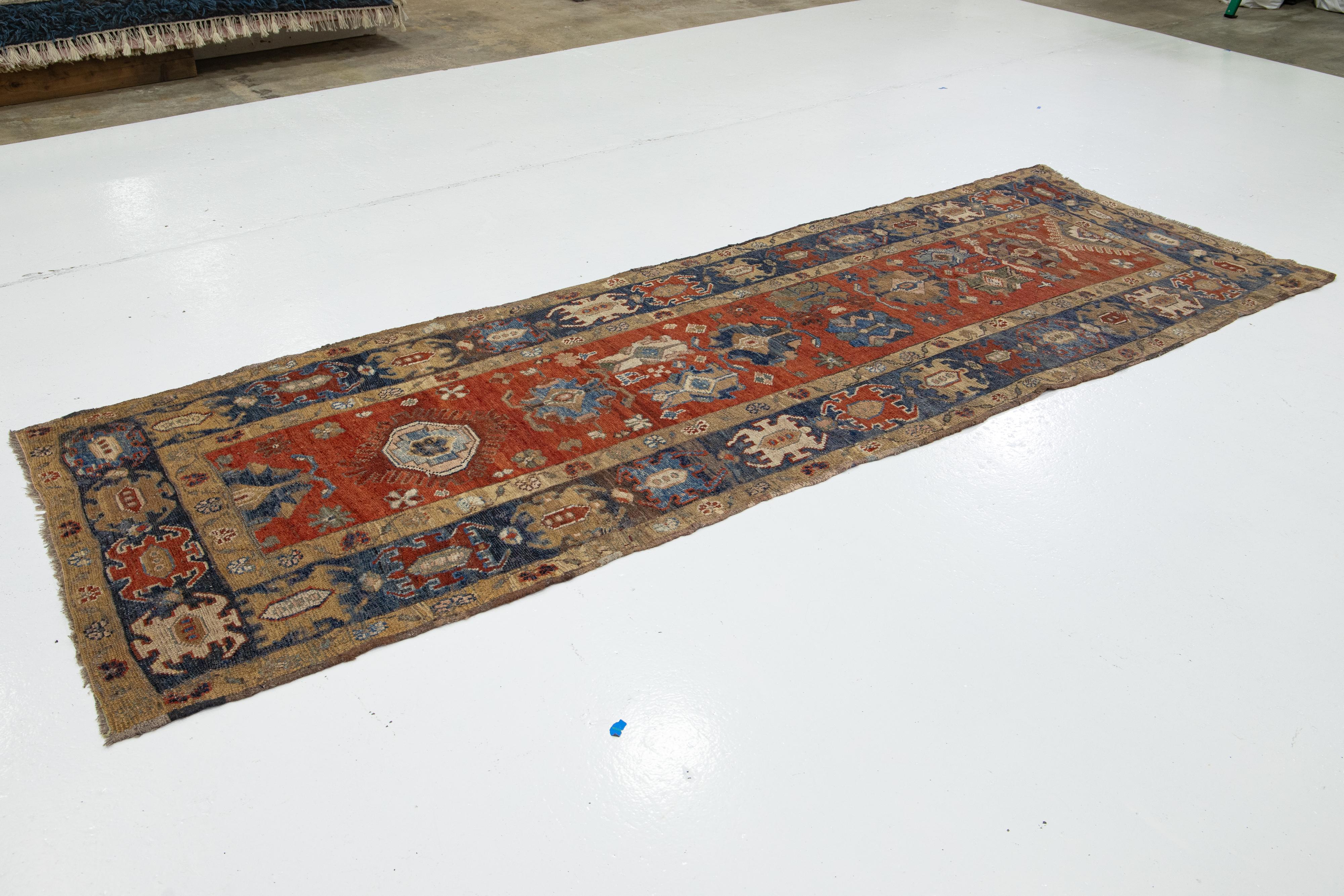 Afghan Vintage Handmade Heriz Rust Wool Runner with Floral Motif For Sale