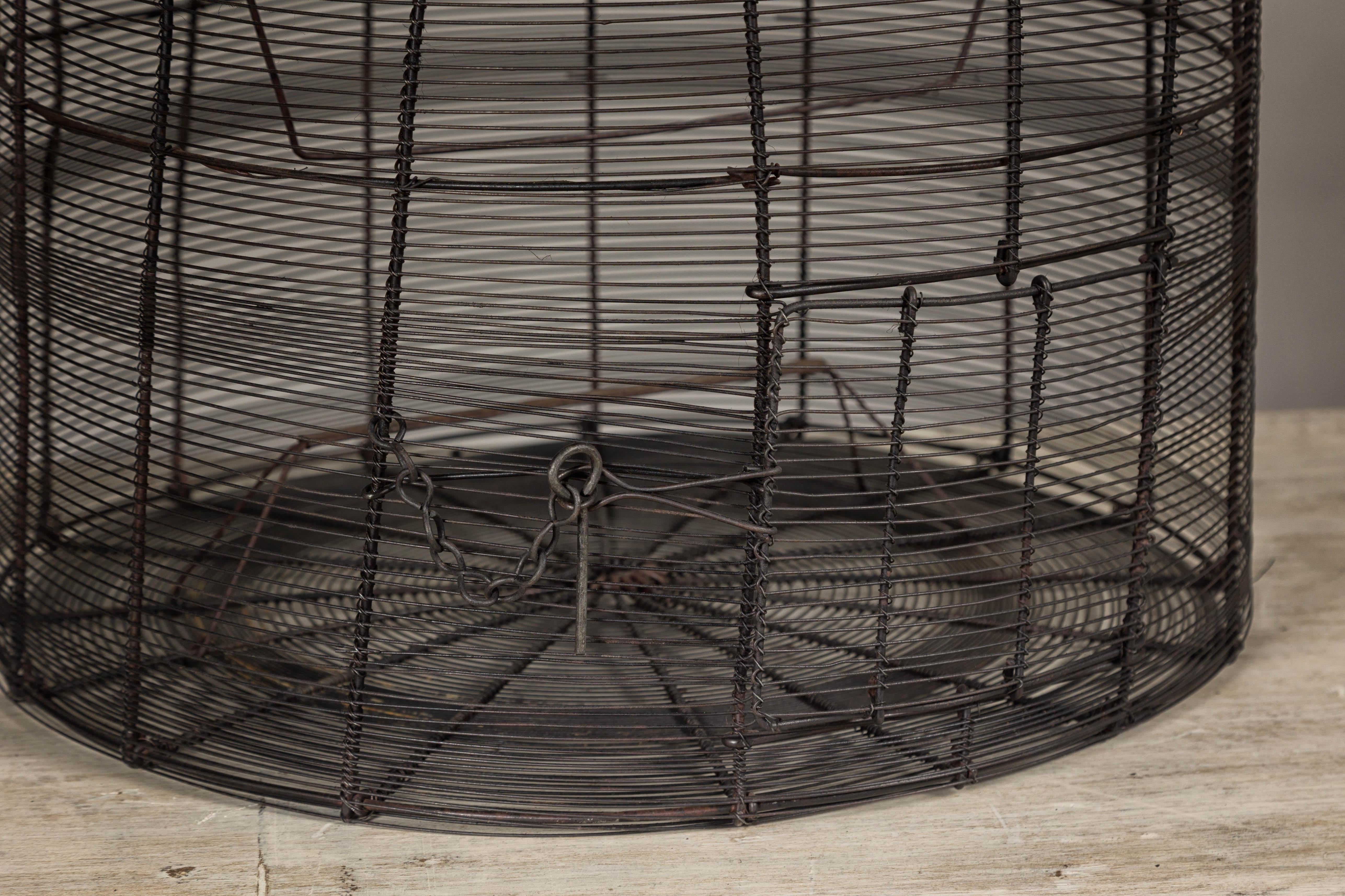 Vintage Handmade Metal Round Shaped Birdcage with Rustic Character For Sale 4