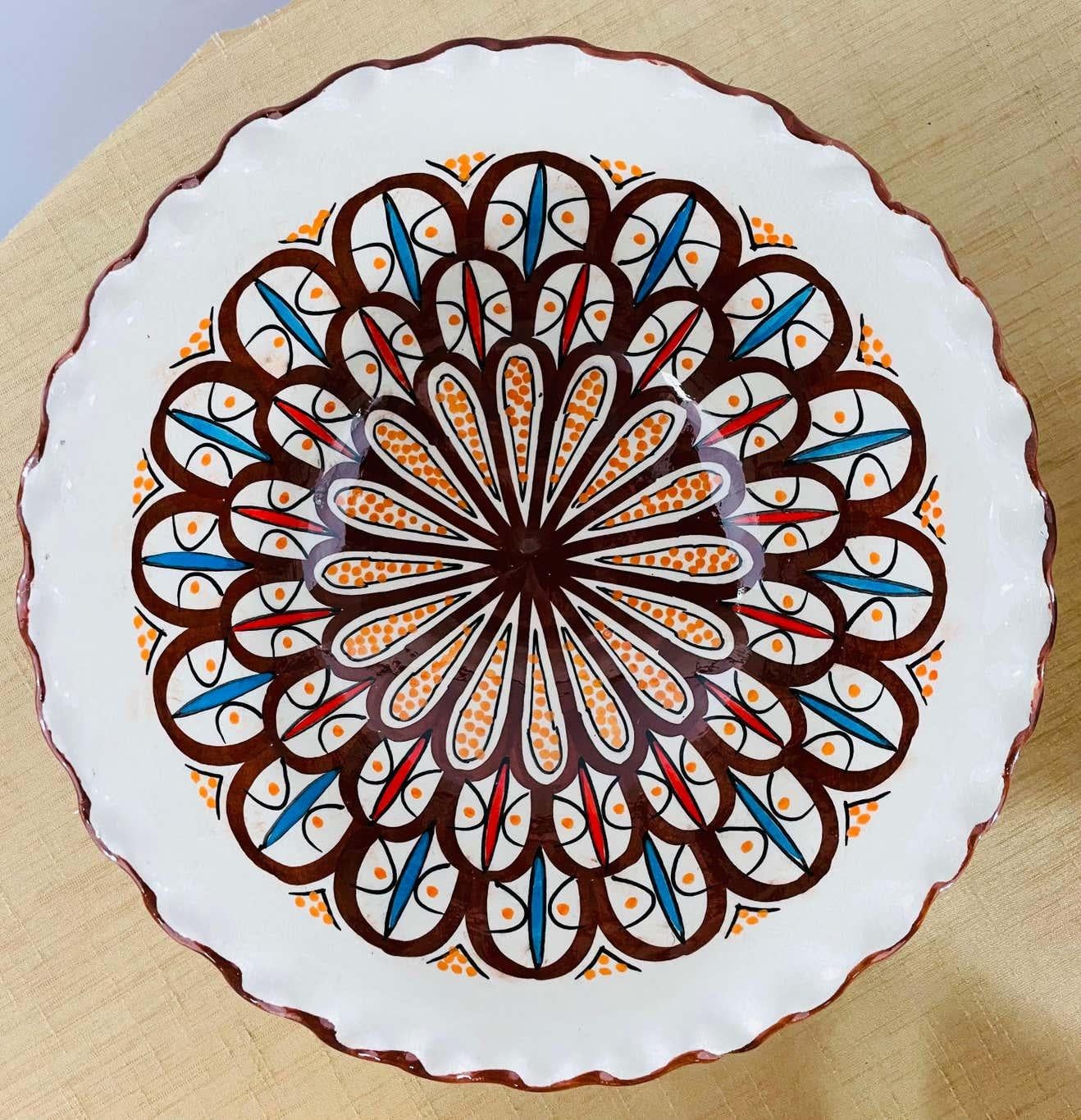 A pair of Boho Chic handmade ceramic large bowls. These stunning bowls feature an arabesque pattern and an entrancing fusion of color in white and brown handcrafted in the coastal city of Safi in Moroccan, which is renowned for its high-quality