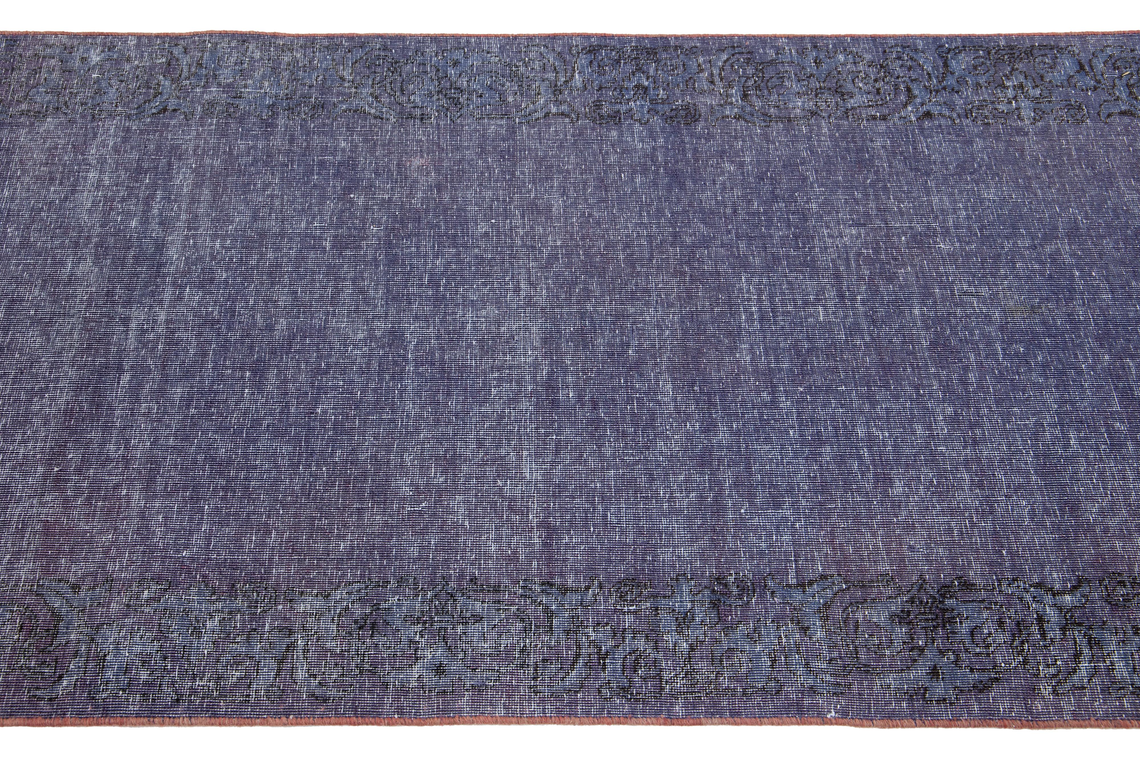 20th Century Vintage Handmade Persian Overdyed Blue Wool Rug With Allover Design For Sale