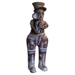 Portacandele singolo d'epoca in ceramica fatta a mano, musicista
