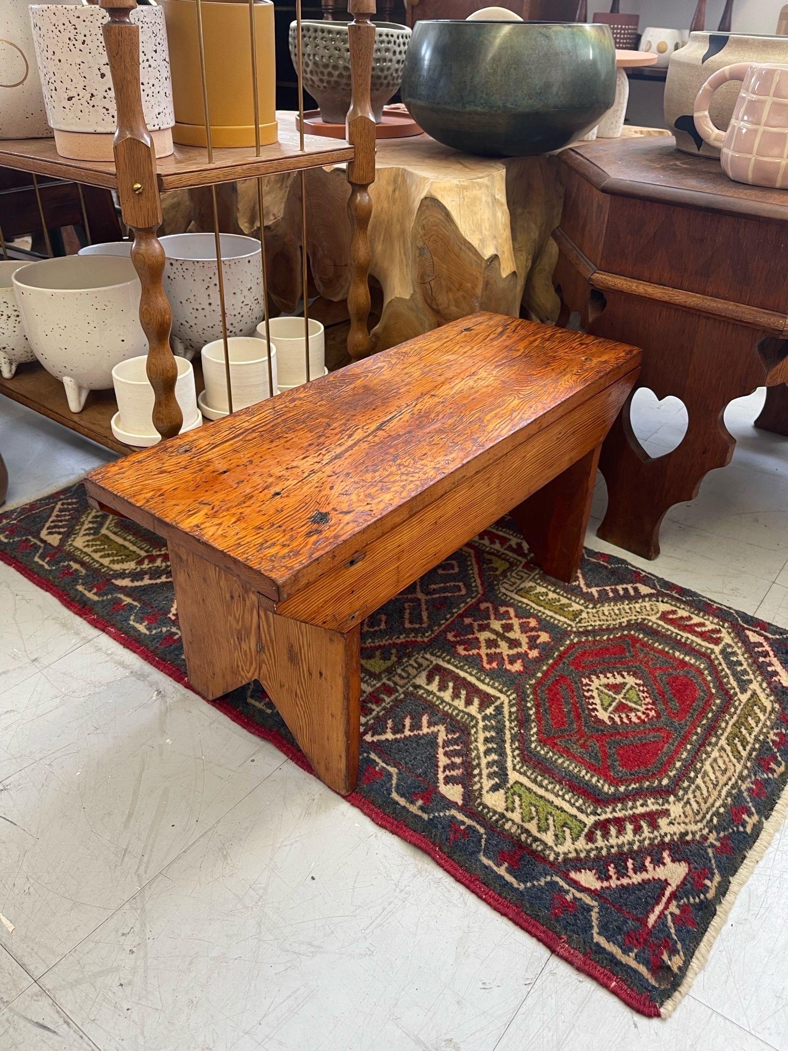 Striking wood tone, possibly made from oak. This Bench could also be used as foot stool. Vintage Condition Consistent with Age as Pictured.

Dimensions. 24 W ; 9 D ; 12 H