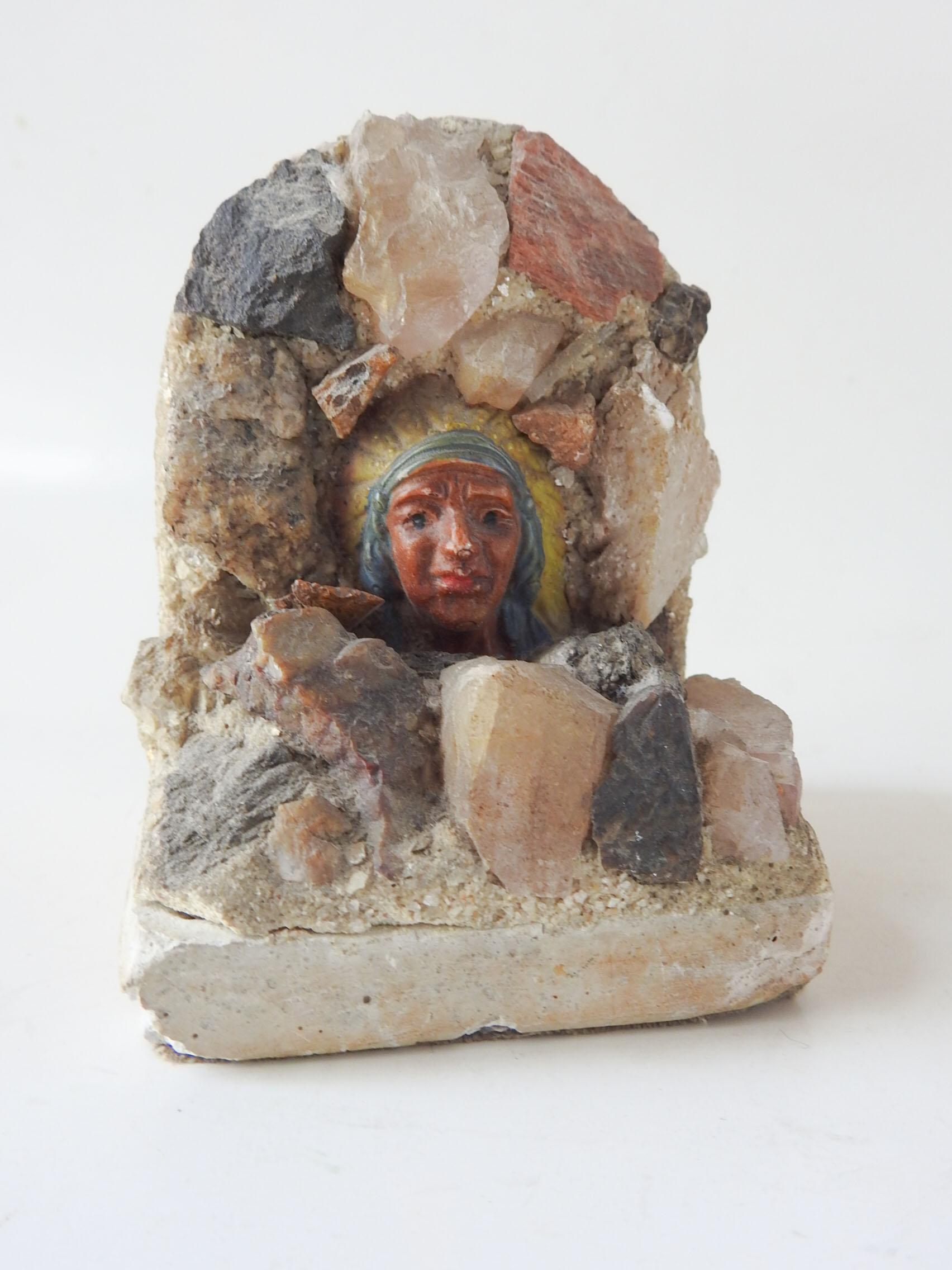 Vintage circa 1930's handmade rock and quartz bookends. A souvenir of the Black Hills, South Dakota. Made of hard plaster with Native American bust figure, rose quartz, petrified wood, mica and other various stones, felt on bottom. Overall wear,