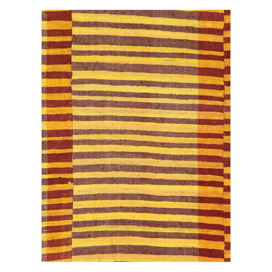 A vintage Turkish flat-weave Kilim accent rug handmade during the mid-20th century.

Measures: 6' 5