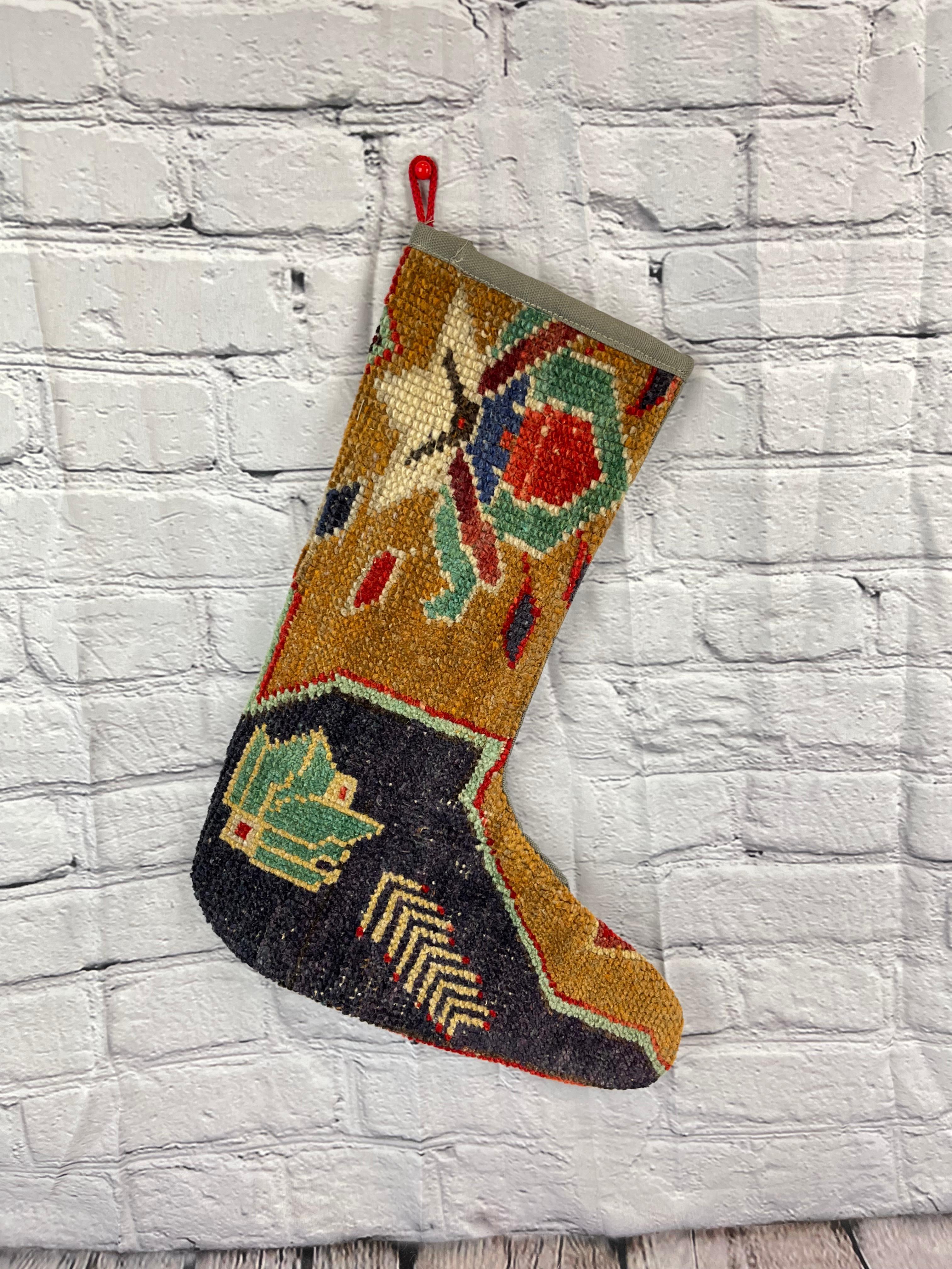 Handmade
Vintage from the 1960s
Materials: wool, cotton

Sustainable, upcycled Turkish rug Christmas stocking made from hand-woven rug fragments. 
Width: 13 inches
Height: 17 inches
Christmas Stocking
Turkish Rug Stocking
Handmade Stocking
Vintage